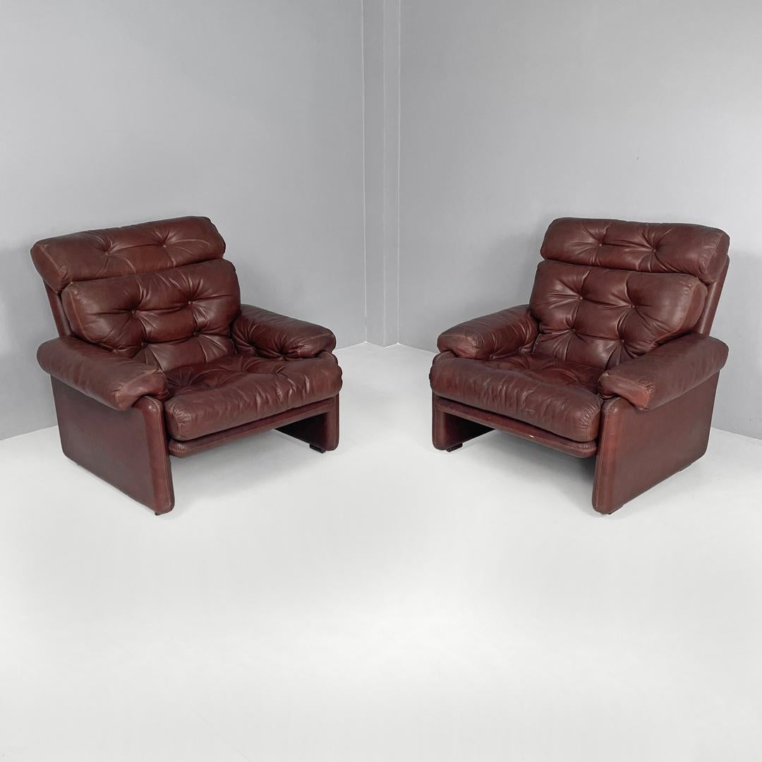 Italian modern brown leather armchairs Coronado by Afra and Tobia Scarpa for B&B, 1970s
Pair of armchairs mod. Coronado in brown leather with high back. The seat, armrests and backrest have curved and soft lines, with buttons. The external structure