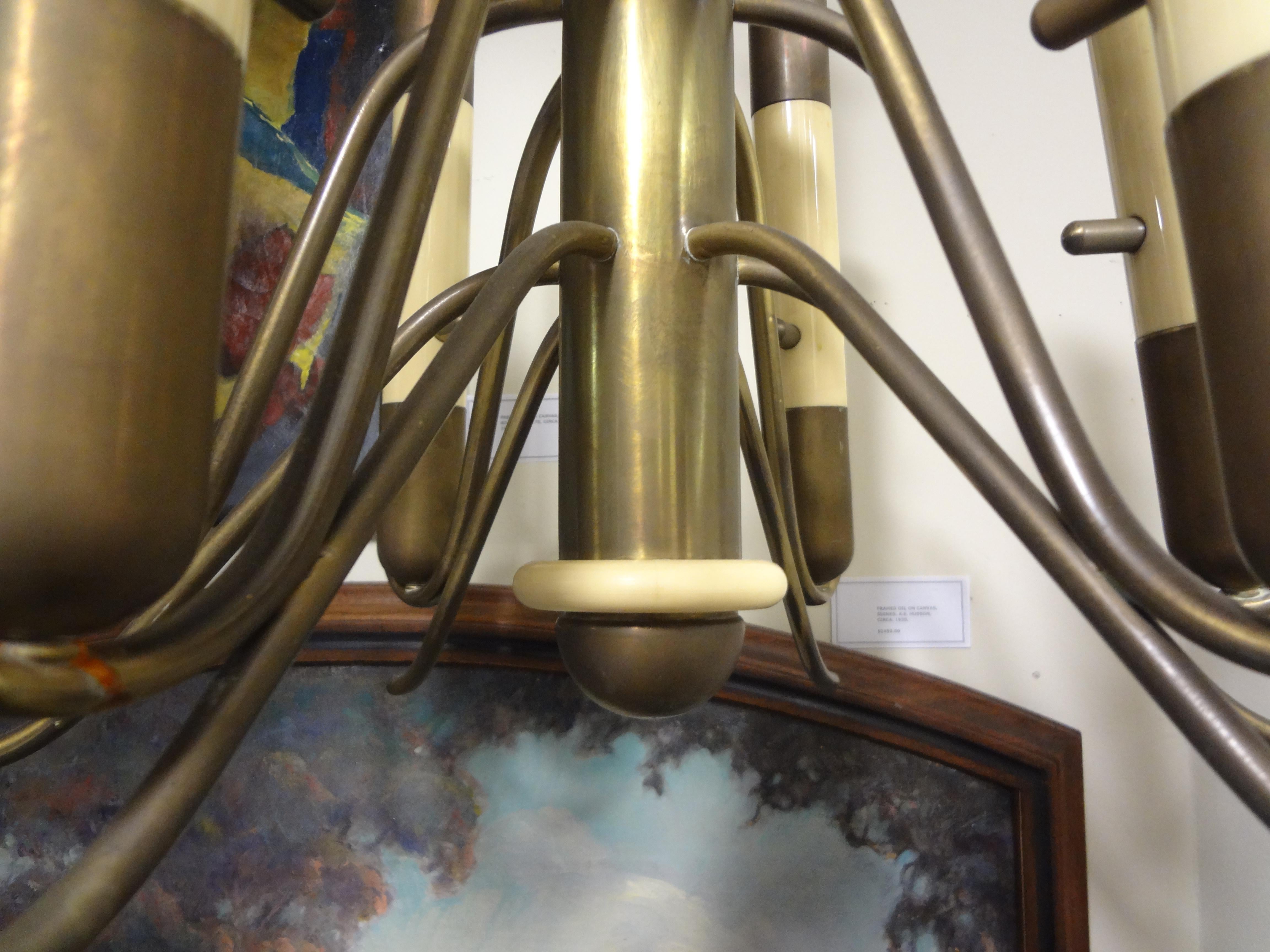 Italian Brutalist Brass and Bakelite Chandelier by Nucleo Forme In Good Condition For Sale In Houston, TX