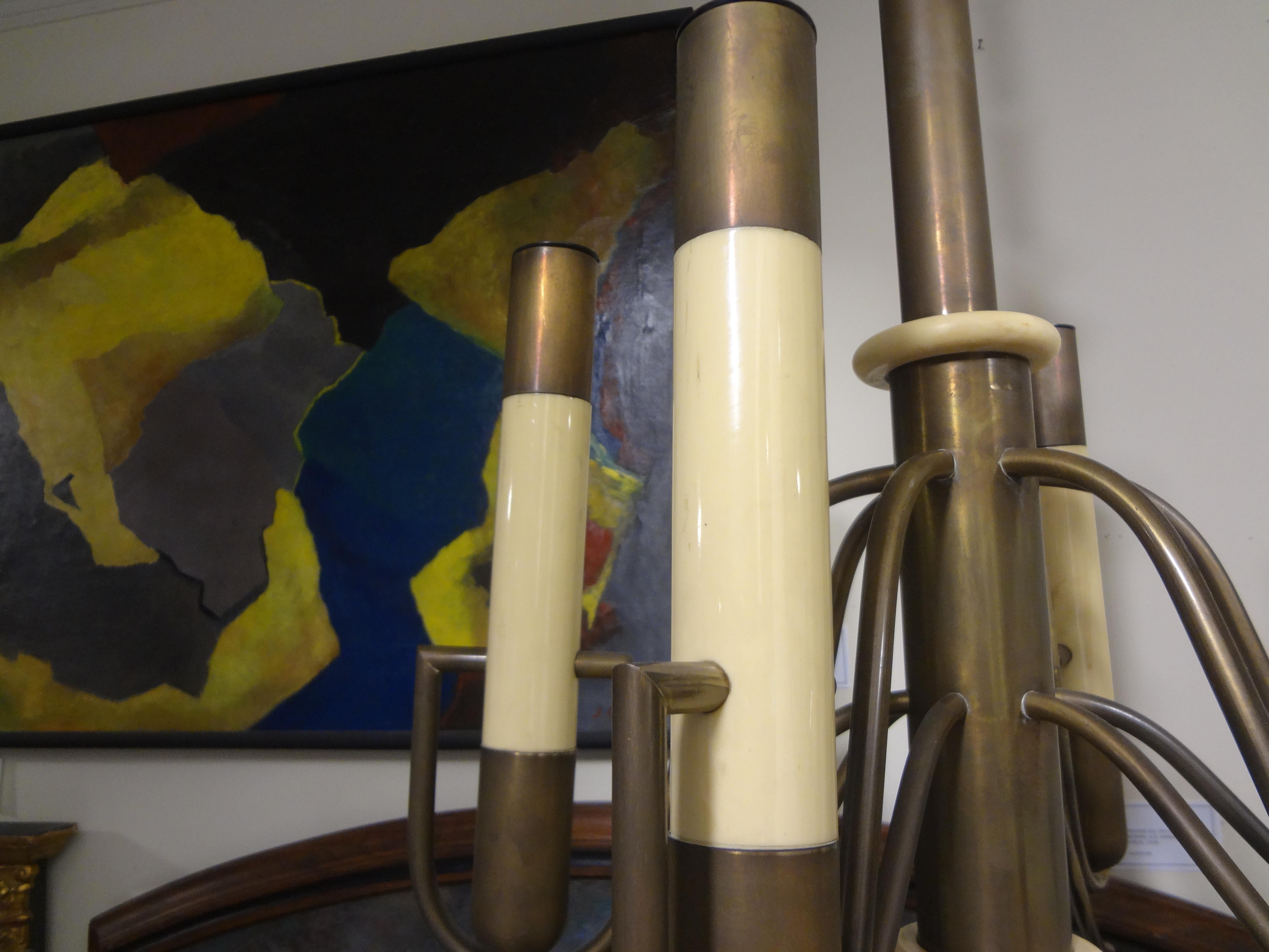 Mid-20th Century Italian Brutalist Brass and Bakelite Chandelier by Nucleo Forme For Sale