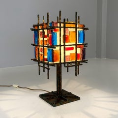 Italian brutalist geometric brass and colored glass table lamp, 1950s