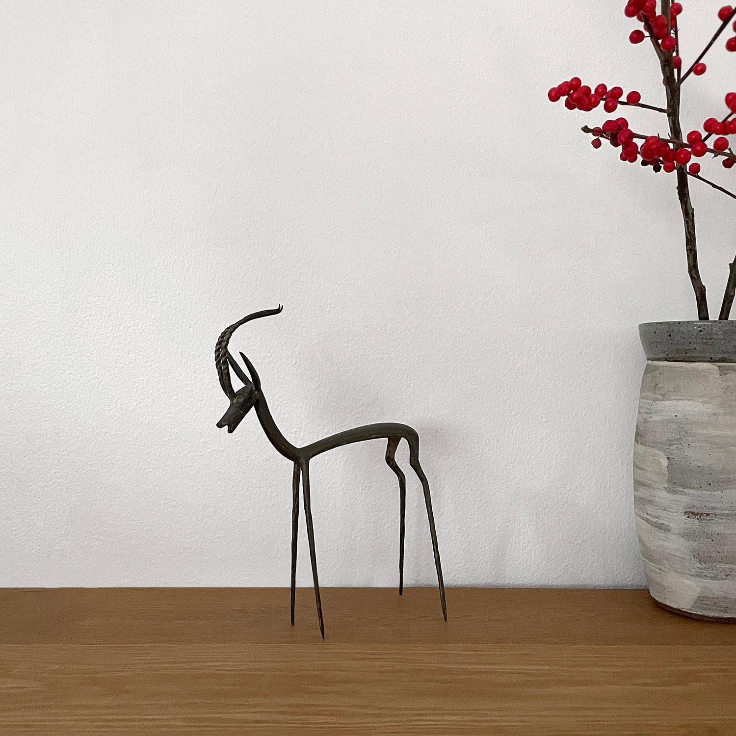 Italian brutalist iron antelope sculpture 
Italy, circa 1950s 
Beautiful sculpted handcrafted artisanal piece
Antelopes are said to be symbols of spirituality and freedom 
Patina from age and use 
Last photo is for reference only
Please see other