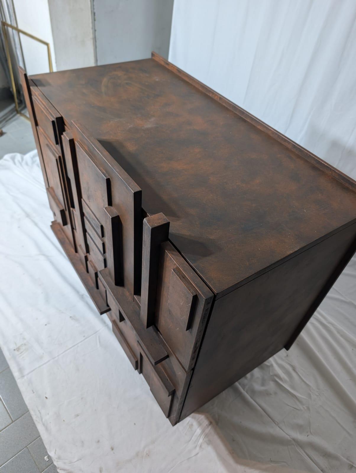 Introducing a timeless piece of furniture that will elevate your home - an Italian Brutalist Sideboard from the 1990s. Immerse yourself in the celebration of post-modern era with this lacquered wooden piece of furniture, whose designer and producer