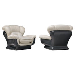 Italian Bulky Pair of Lounge Chairs in Fiberglass and Leatherette 