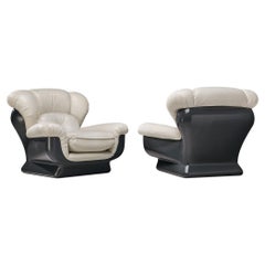 Italian Bulky Pair of Lounge Chairs in Fiberglass and Leatherette