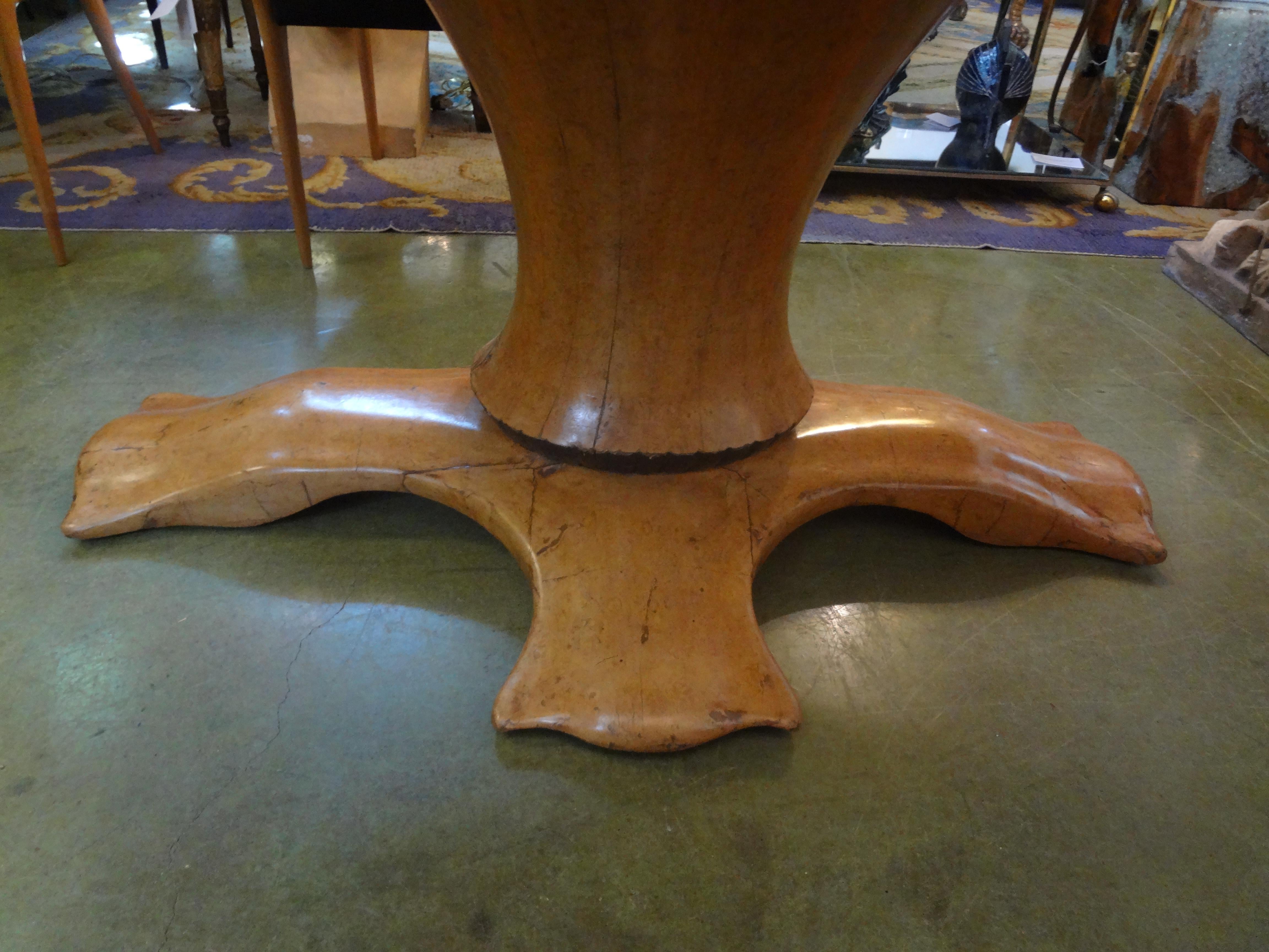 Exceptional Italian Organic Modern Center Table-Osvaldo Borsani Attributed.
Exceptional Italian organic modern burled olive wood oval center table or dining table attributed to Osvaldo Borsani. This outstanding Neoclassical style pedestal table has