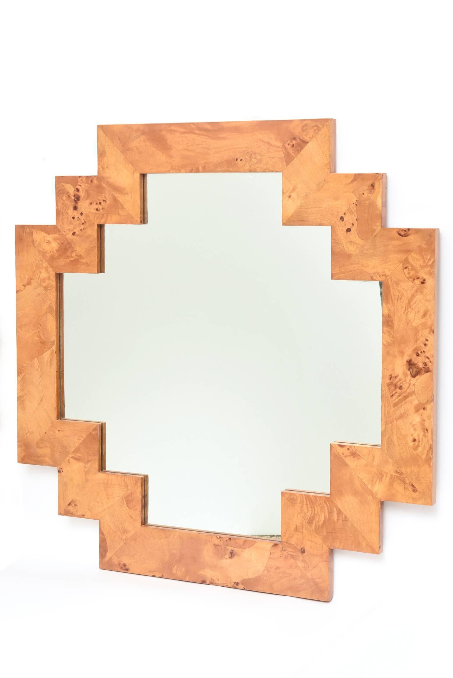 This gorgeous Italian geometric vintage step burled elmwood mirror is a knockout! This is great over a console or cabinet or by itself. It is marked Italy on the back. The wood has been restored with the same satin finish that was original to the