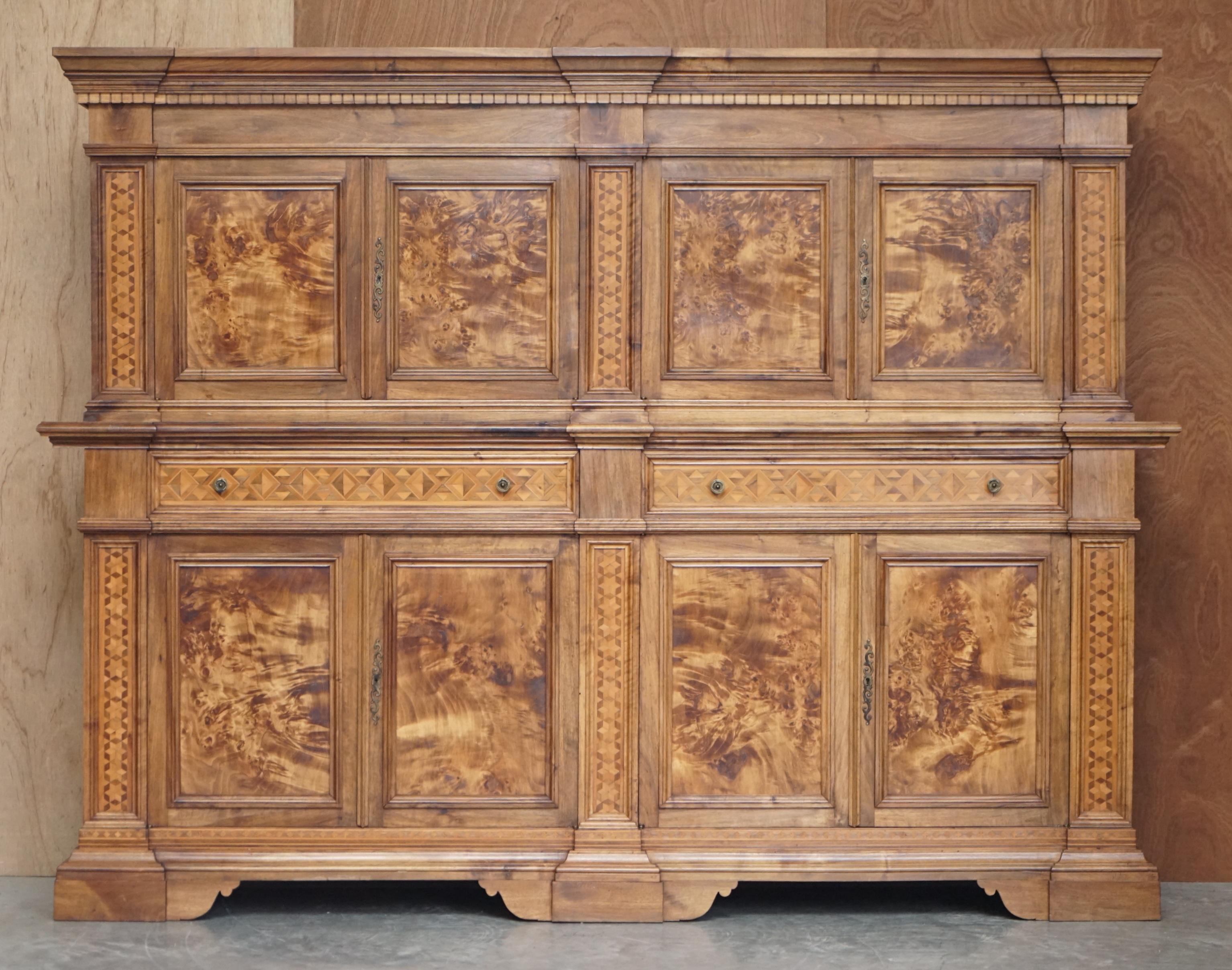 We are delighted to offer for sale this lovely vintage Italian Burr & Pippy oak Housekeepers cupboard for folded linens or pots with geometric marquetry inlay

This is truly a stunning piece, the burr & pippy oak panels are 100% solid slabs of