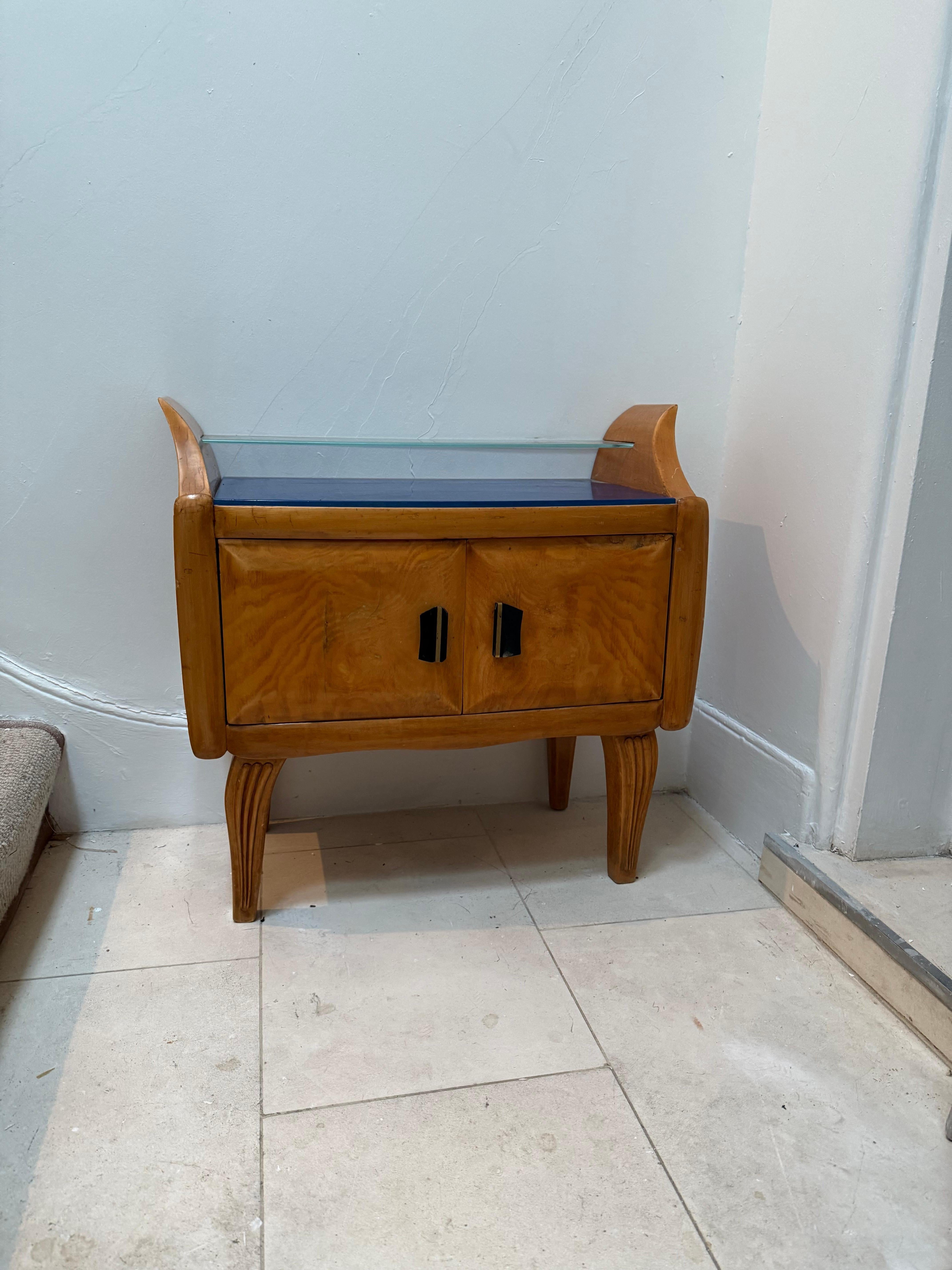 A pair of Italian c.1940's bedside tables by V.Dassi in ash and clear top glass shelve with a blue glass at the bottom