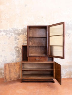 Italian cabinet in walnut, brass and ribbed glass, circa 1930s.