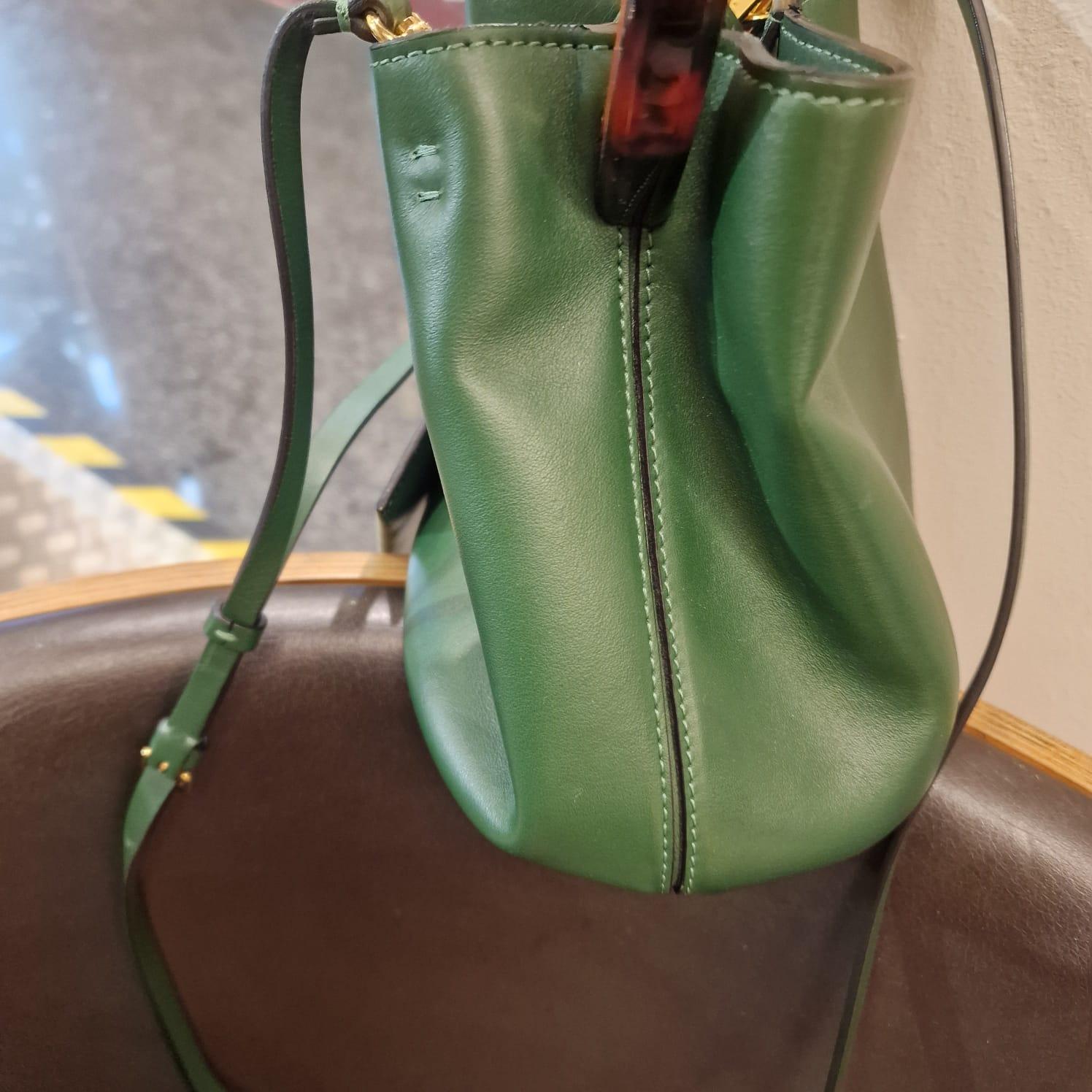 Italian calfskin bucket bag English green colour.Leather shoulder strap wit 11