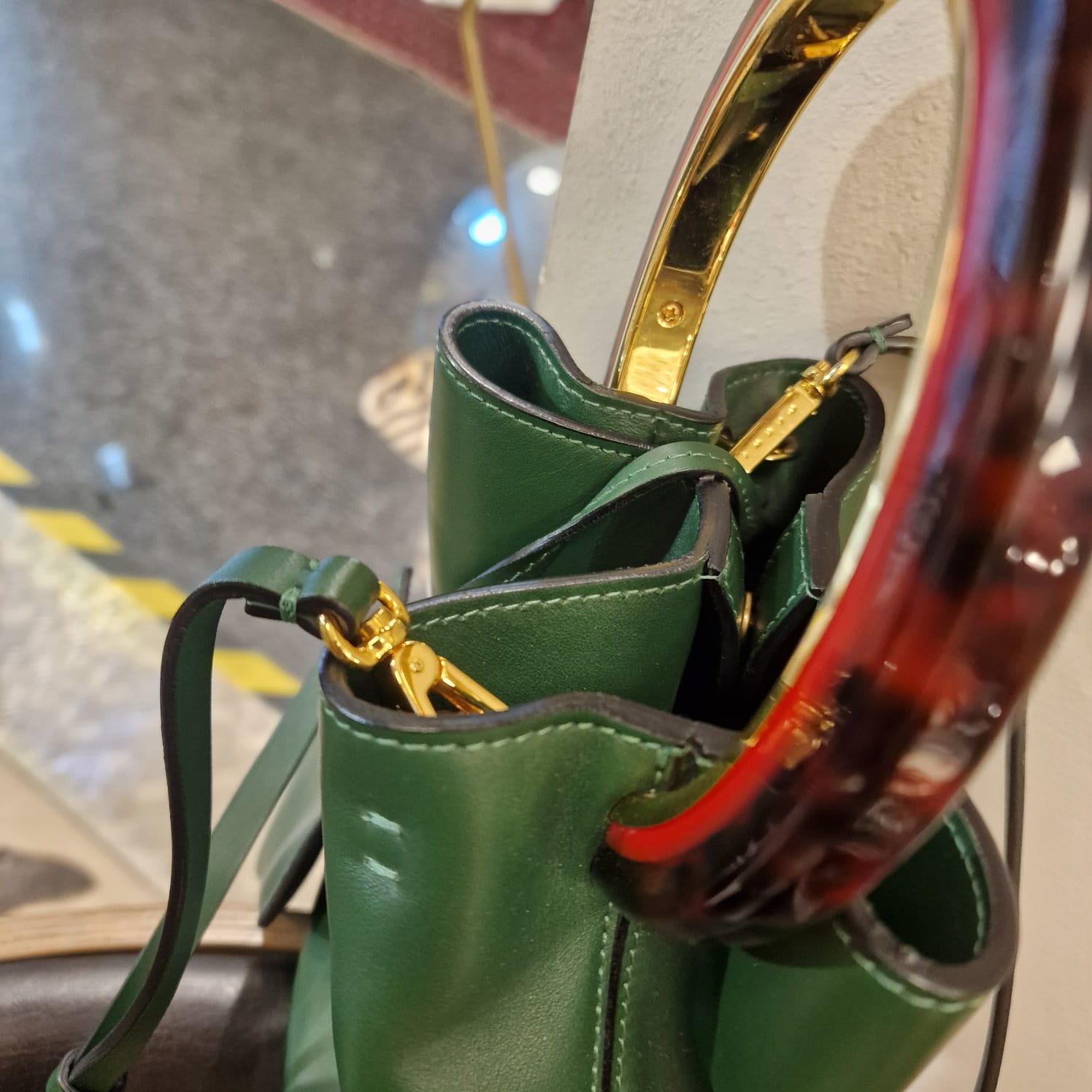 Italian calfskin bucket bag English green colour.Leather shoulder strap wit 12