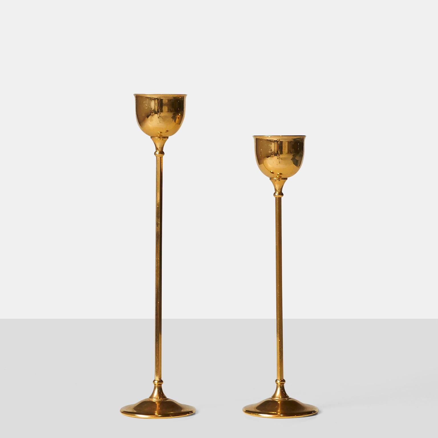 A pair of gold plated tulip candlesticks by Italian manufacturer William Adams.
Marked on the base.