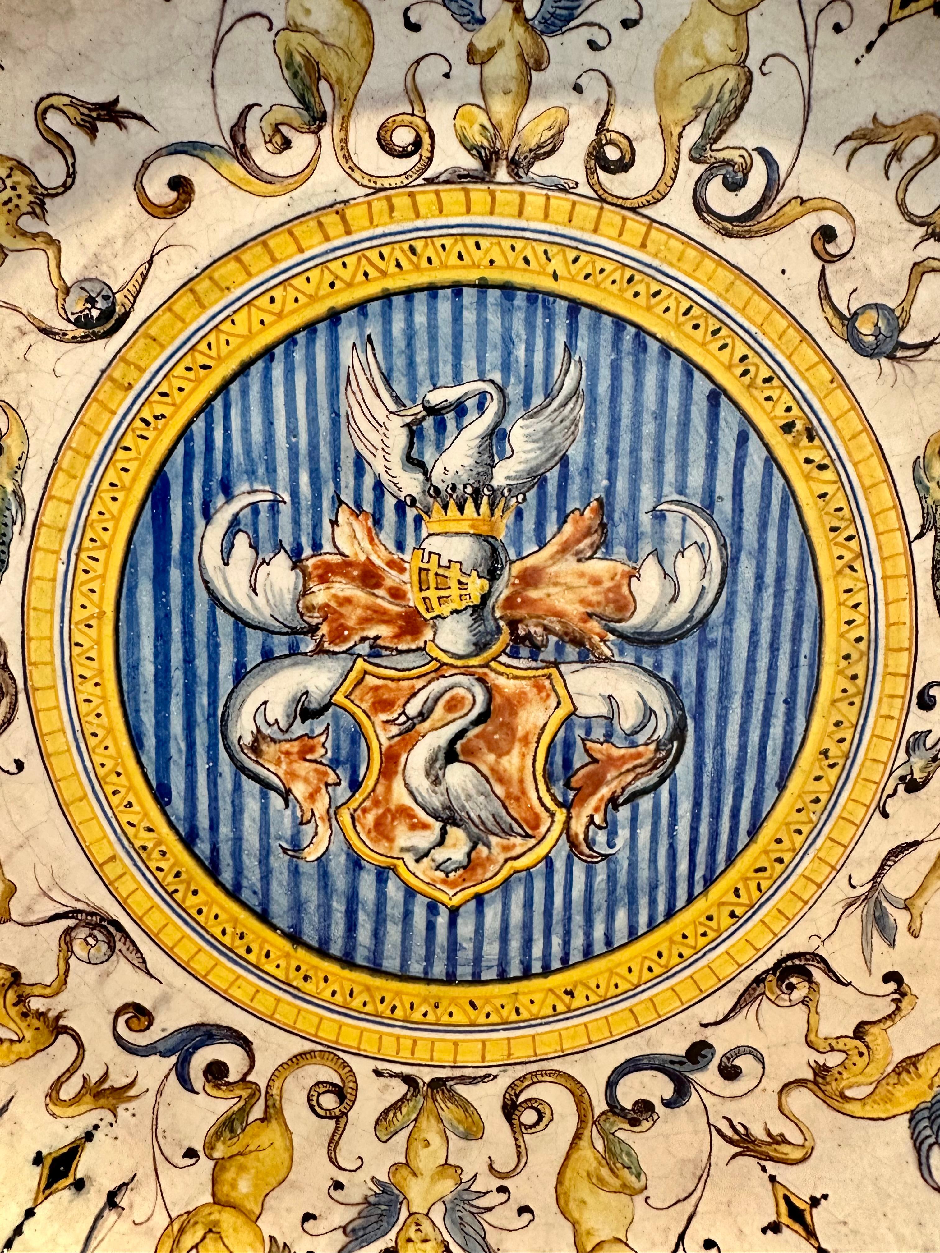 Italian Cantagalli Maiolica Large Plate with family noble emblem, Late 19th Century 

During the 19th century Renaissance-Revival period the Cantagalli Maiolica and ceramic factory near Florence produced authentic copies of Renaissance Maiolica