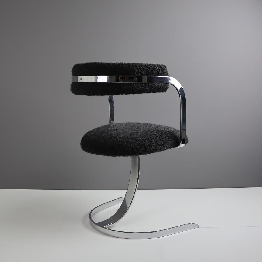 Italian chrome cantilever chair reupholstered with an Italian charcoal bouclé fabric from Designers Guild’s Lana collection.

This chair was bought at an auction in the fall of 2022. We are big fans of cantilever chairs but they all tend to look