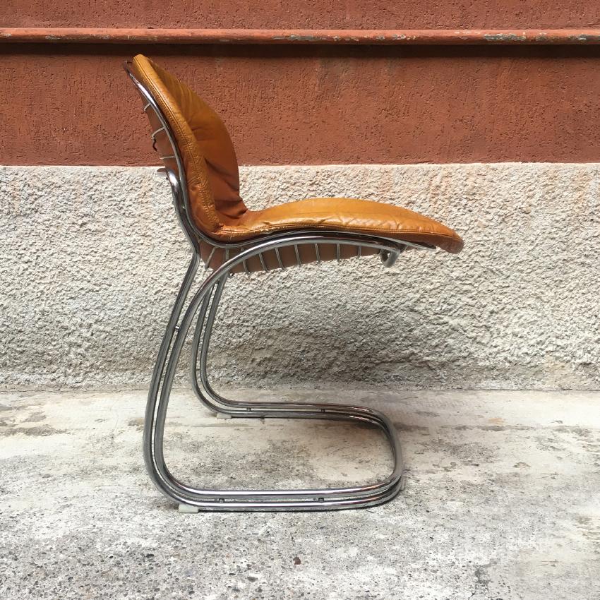 Italian cantilevered dining chair designed by Gastone Rinaldi for RIMA, 1970s
Curved chrome steel Sabrina chair, with seat and backrest covered in a caramel-colored leather, original of the 1970s.
Produced by the RIMA Company, in Padova, and