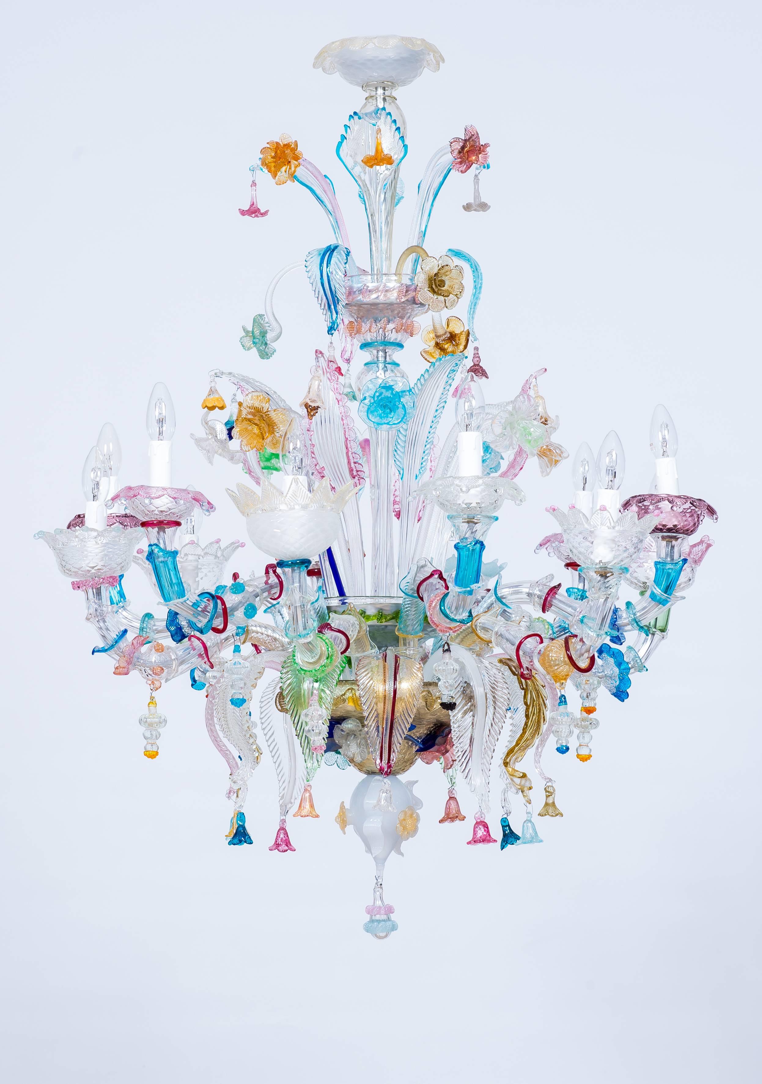 Italian Venetian Multicolored Ca' Rezzonico Chandelier, in blown Murano Glass, 1950s.
The chandelier is composed by 12 lights, allocated in 12 different arms disposed in different levels, with a unique design. As additional decorations, typical for