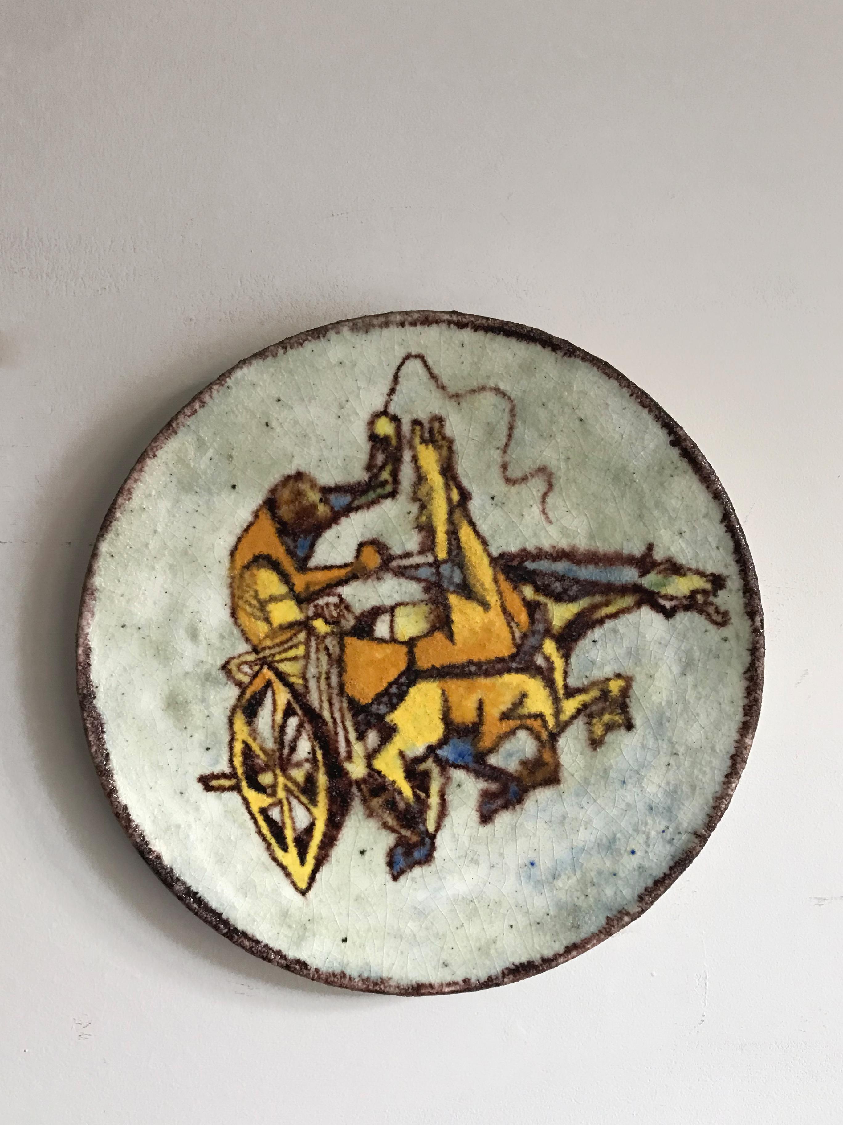Italian midcentury modern design decorative ceramic wall plate designed by the Italian artist Carlo Zauli, decorated in polychrome with depiction of Figure on Chariot, signature of the artist Zauli / Faenza on the back, Italy 1950s.

Please note
