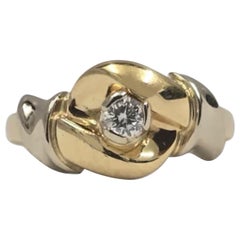 Bague italienne Carmelo en or 18K bicolore avec nœud de diamants