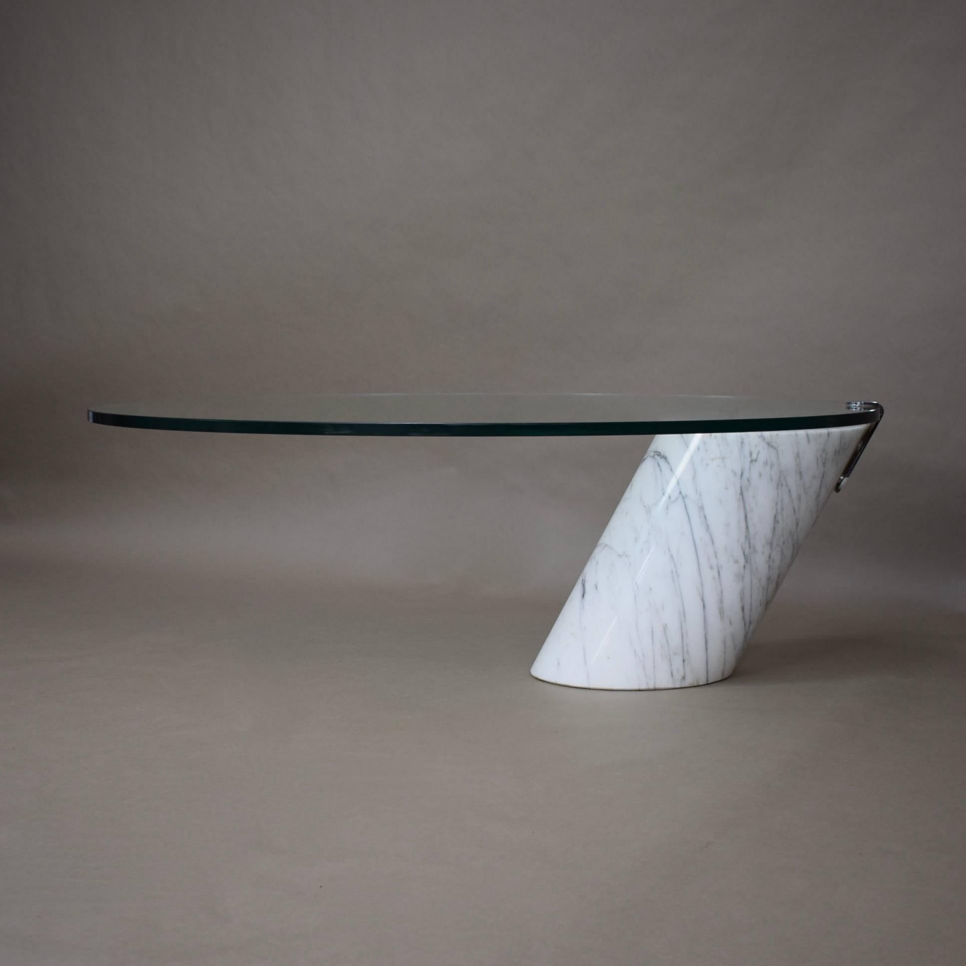Oval cocktail table by Pace Collection. The foot is made of a solid block of Carrara marble. The glass top is made of 2cm thick glass / The glass top can be leveled by turning the two chrome knobs.

Designer: Unknown

Manufacturer: Pace
