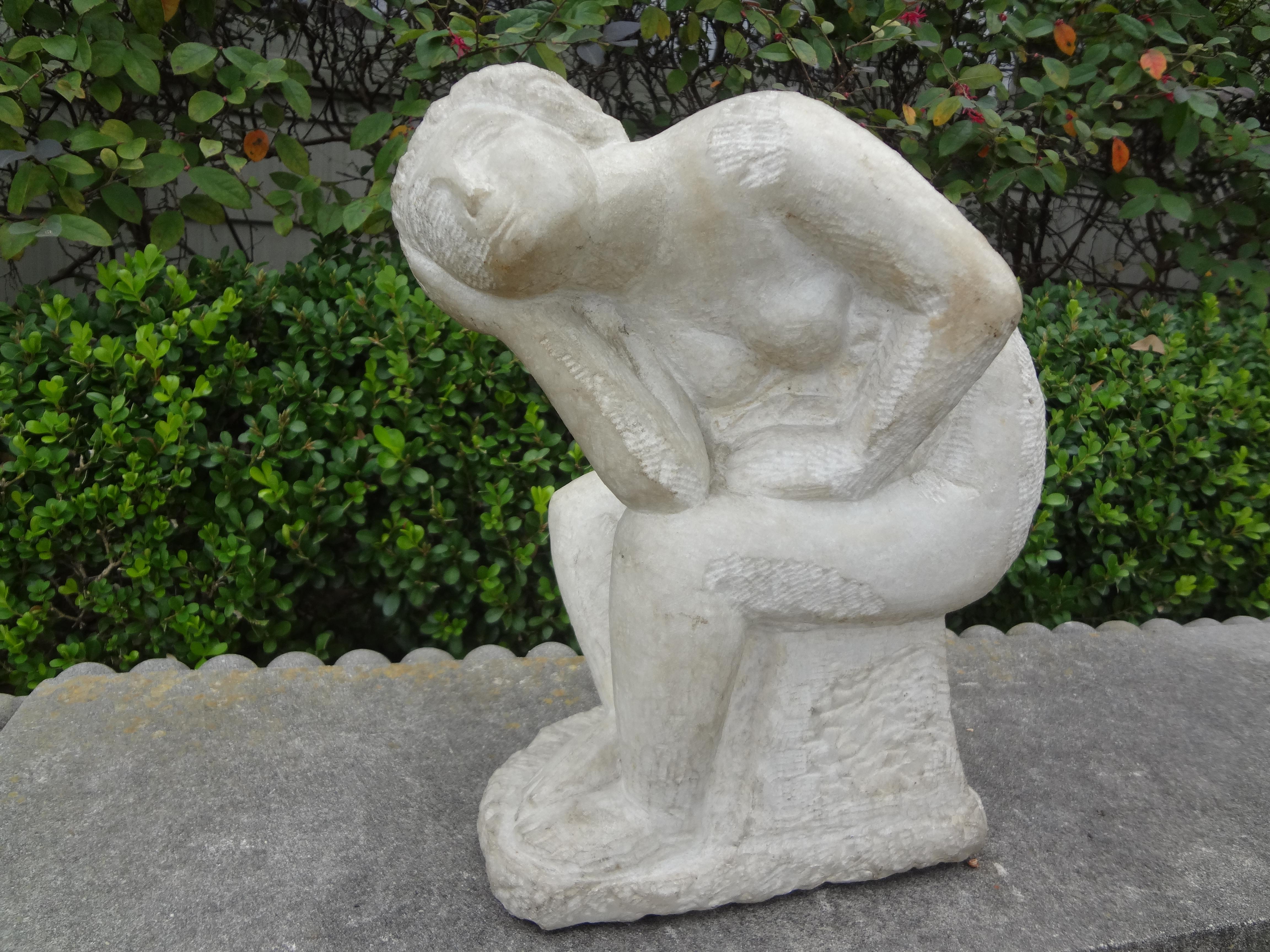 Stunning Italian carrara marble sculpture, circa 1940. Our Italian marble sculpture depicts a woman sitting on a rock. Beautifully executed and artist-signed. See signature in photos.