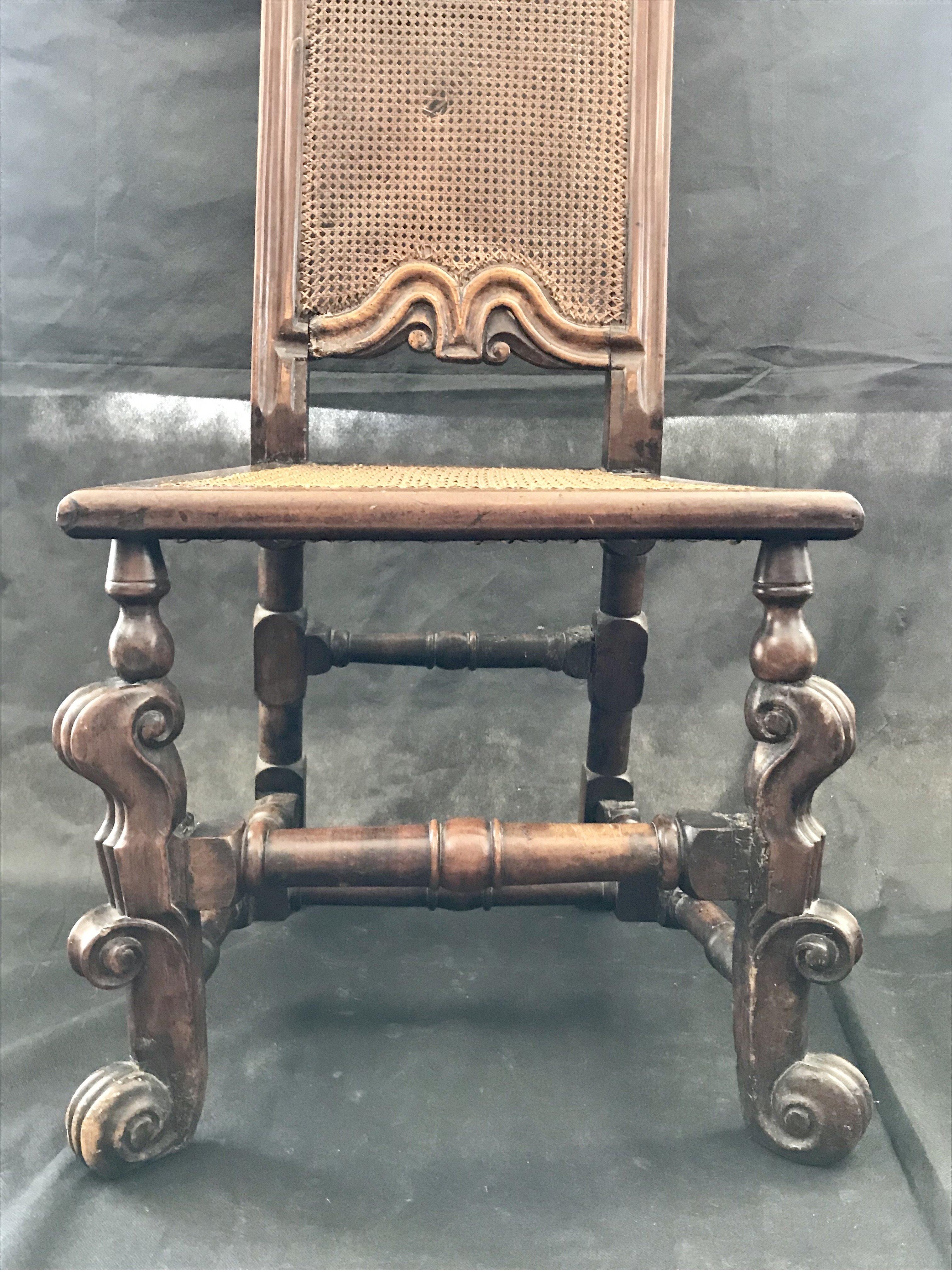 Beautiful antique very early caned tall backed Italian chair. Bought in the South of France. Caning has a small hole on the back but in great shape otherwise. 
#3231.
   