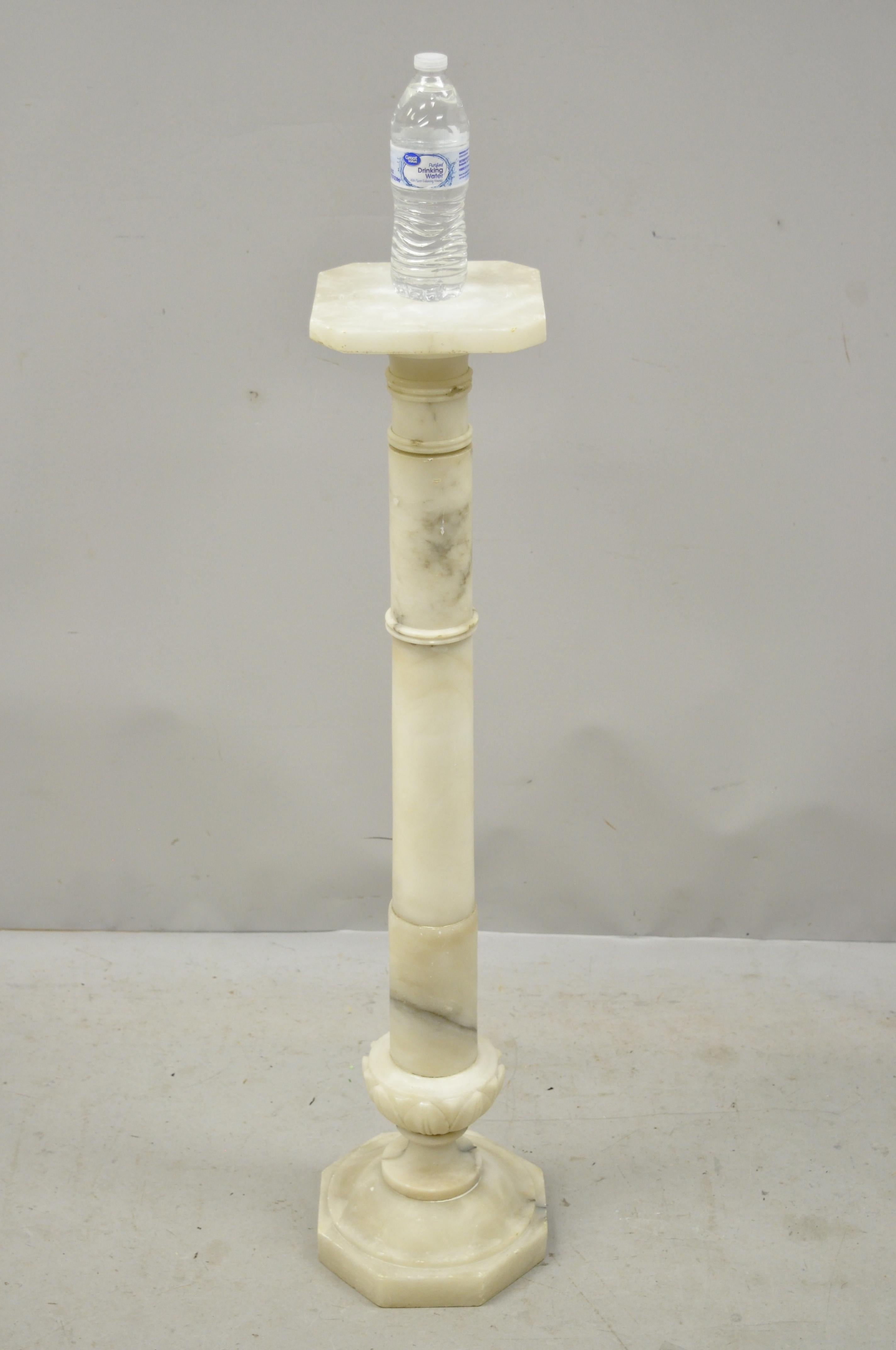 Italian carved alabaster marble classical column statue pedestal plant stand, circa early 1900s. Measurements: 39.75