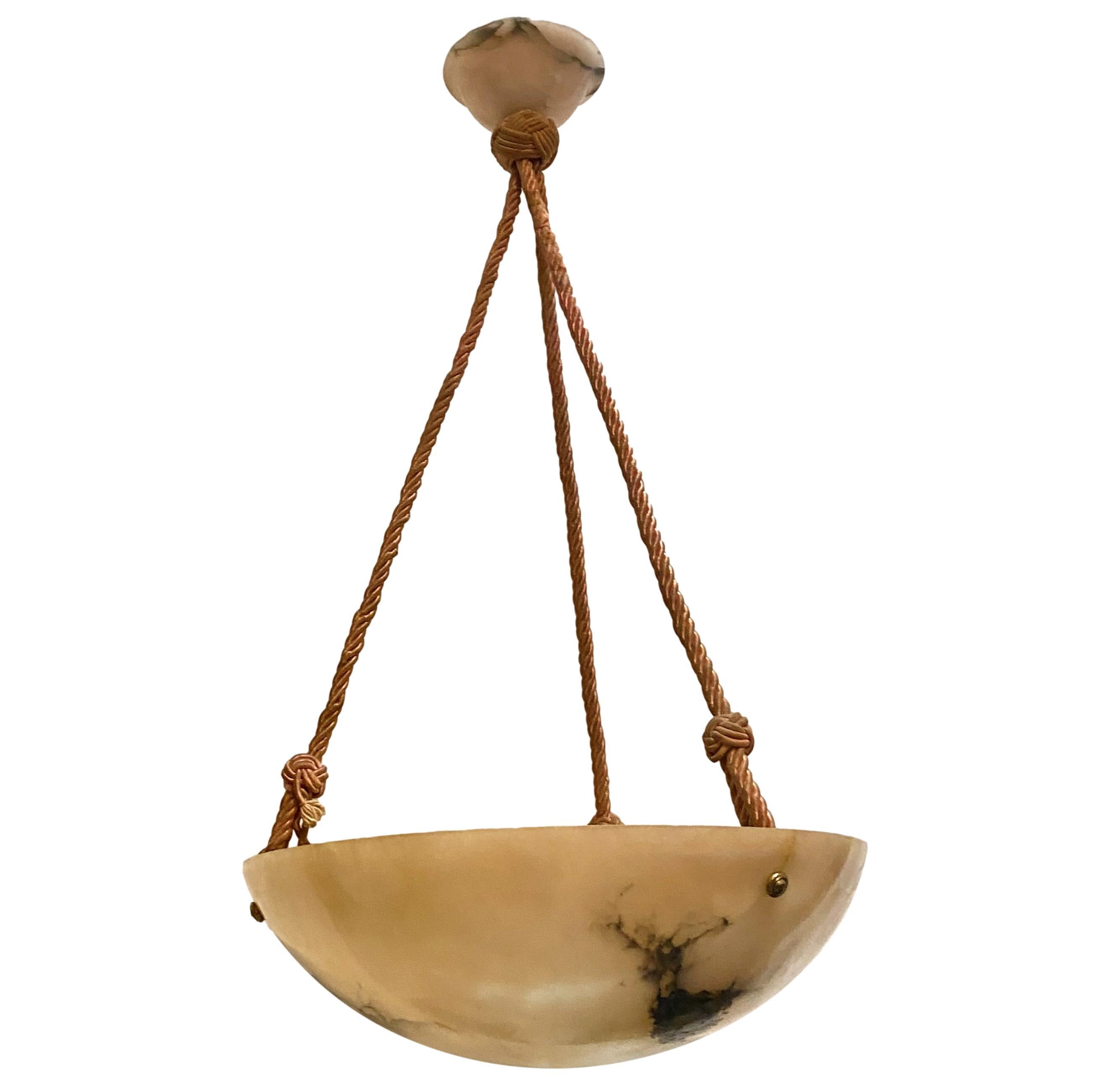 A circa 1920's hand carved Italian alabaster light fixture with silk cords but can be retro-fitted with chain.

Measurements:
Diameter 14
