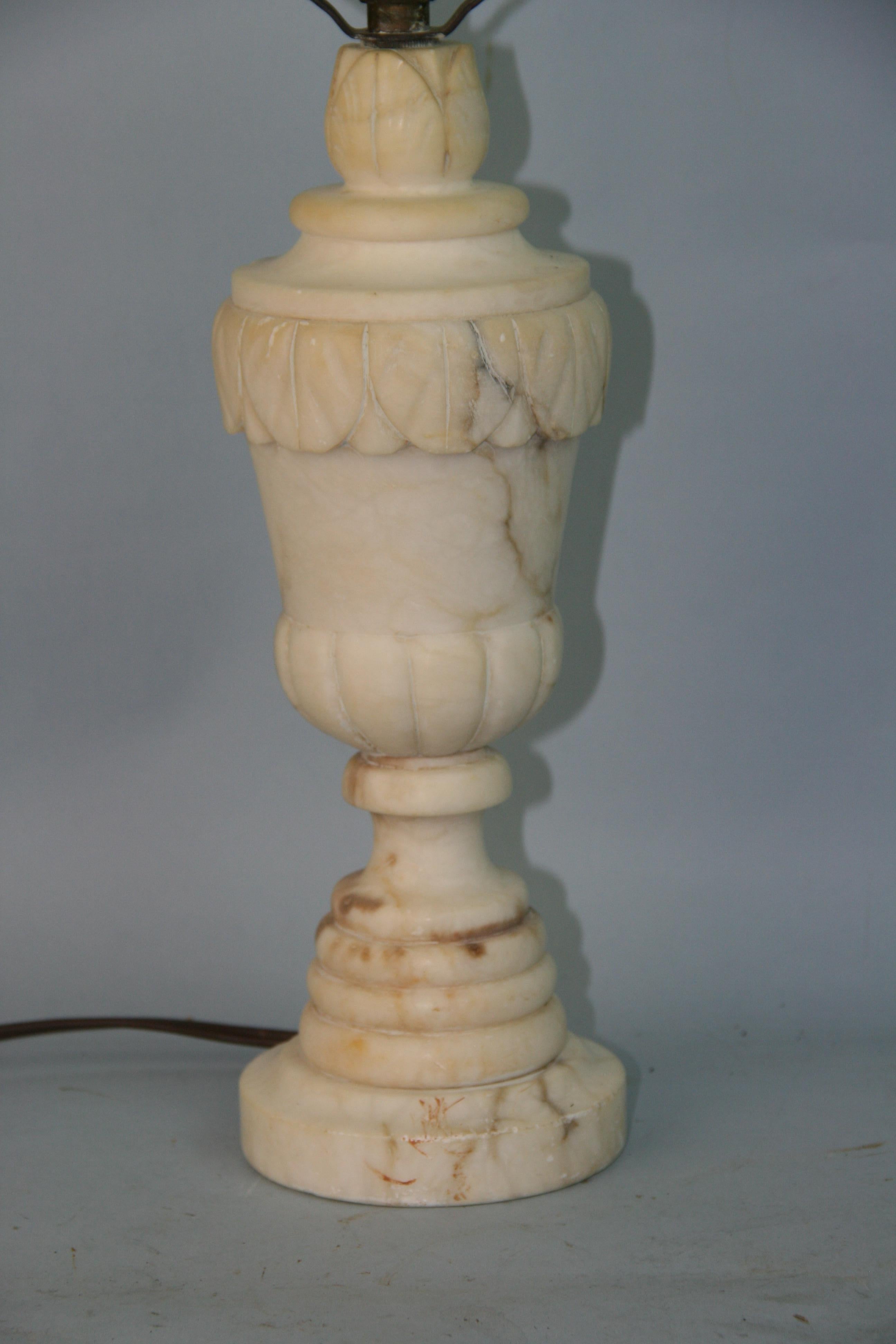 1268 hand carved alabaster table lamp
Measures: 12' to top of socket 
20.5