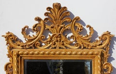 Italienischer geschnitzter und vergoldeter Spiegel