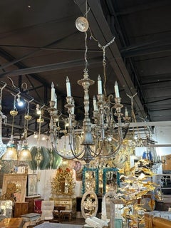 Italian Carved and Silver Leaf Iron 8-Light Chandelier