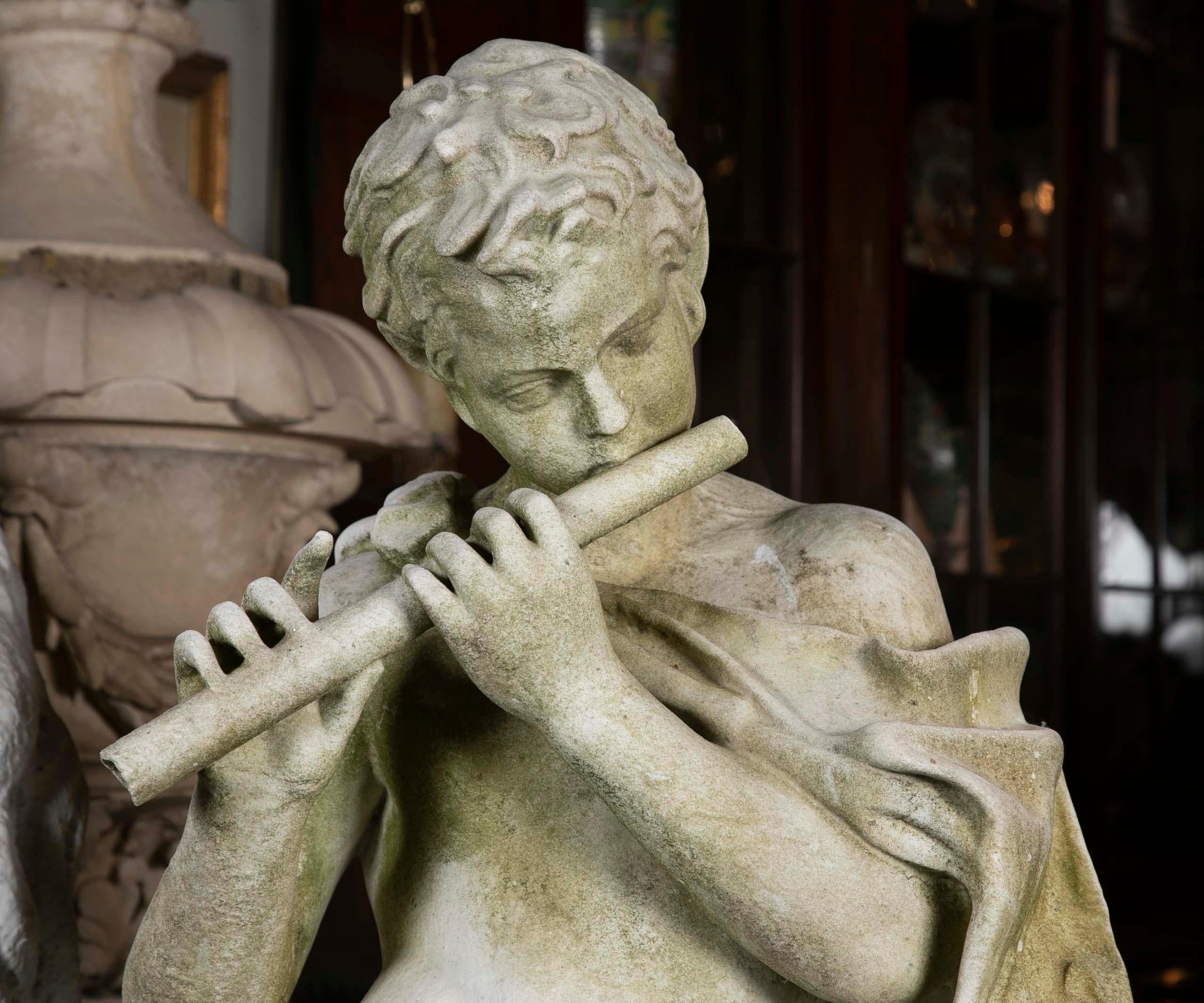 A beautifully carved Italian Carrara marble sculpture of a boy adorned with lions skin cape playing the flute.

Provenance: Black Rock Connecticut Waterfront Estate.