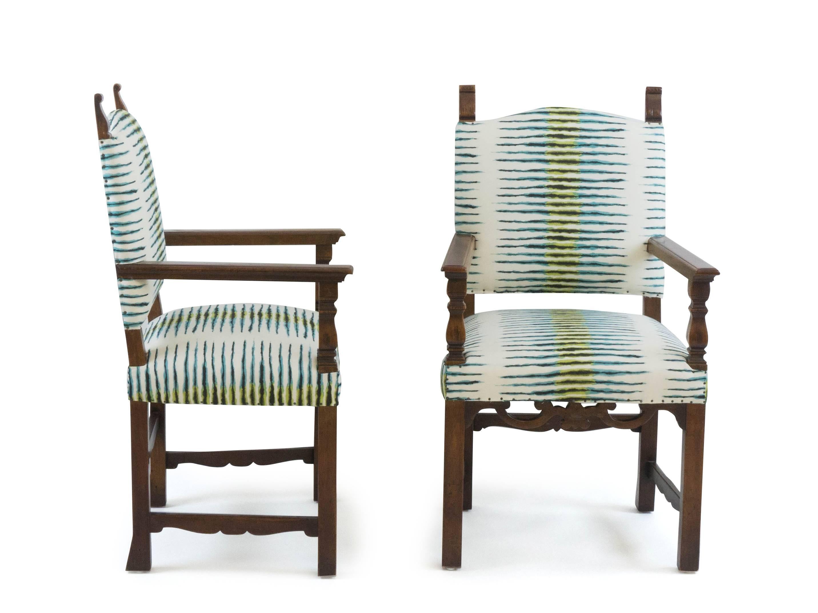 Pair turn of the century vintage Italian chairs newly tailored and finished with exposed small French-style nail heads.  Beautifully carved wood detailing.

