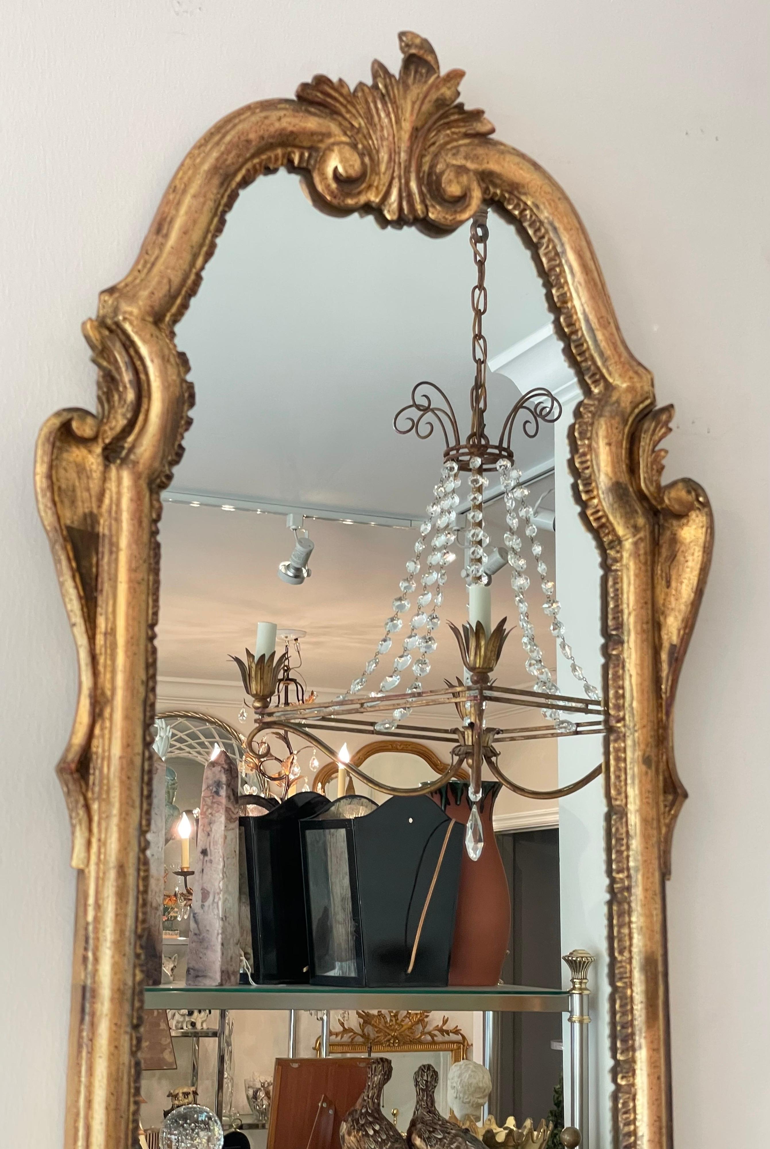 antique mirror with shelves