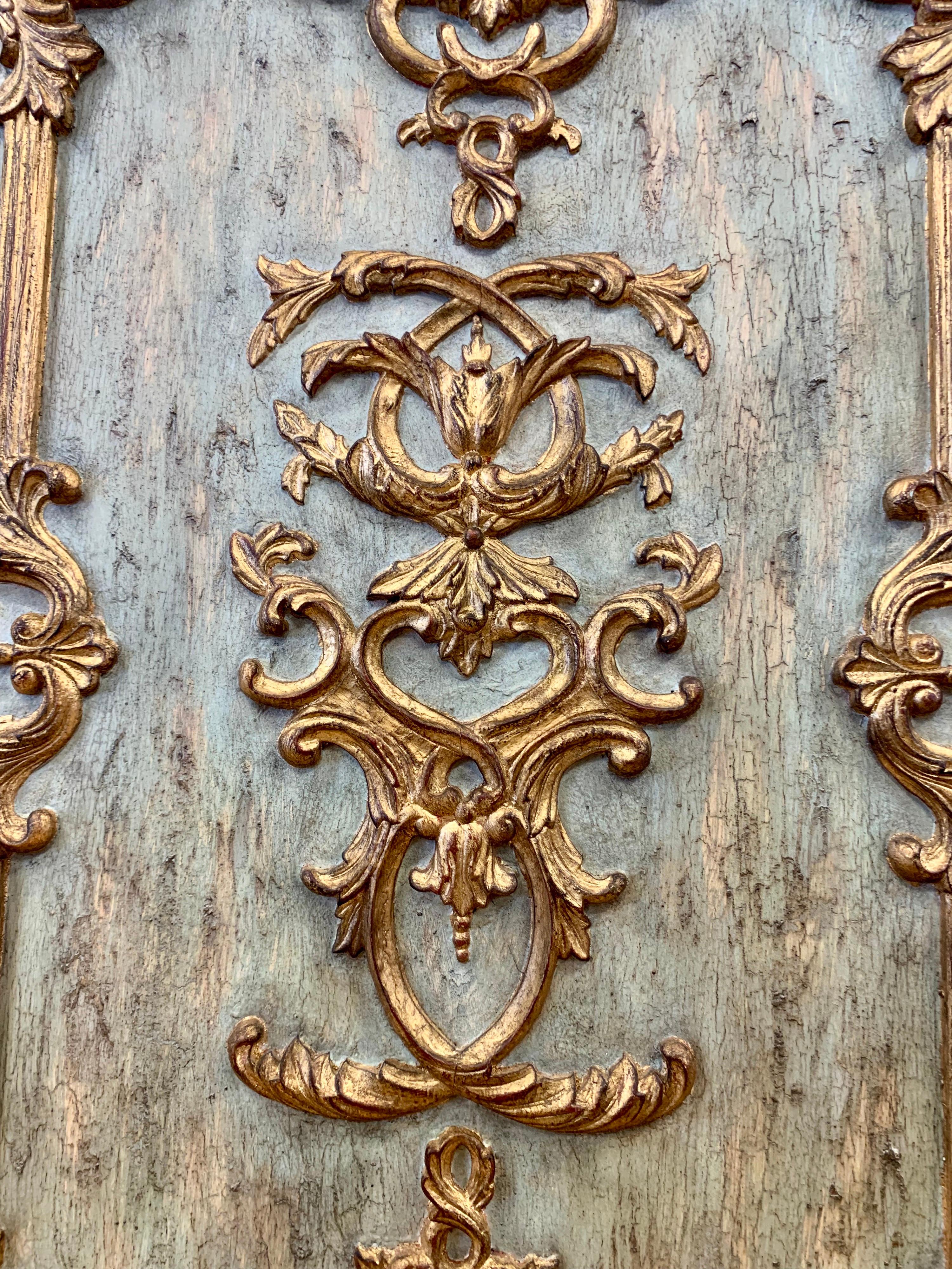 Stunning Italian boiseries panel with carved wood and gilt. Beautiful patinated original light blue paint.