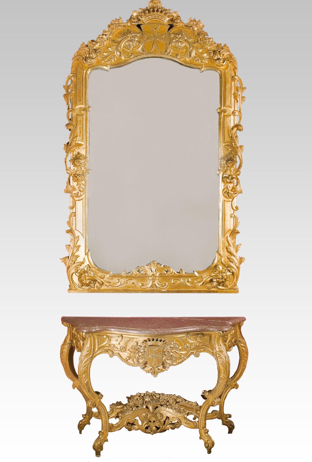 Magnificent Large 19th century Italian Rococo style carved giltwood console and mirror for the Maltese market. 
The beautifully gilt mirror is topped with a royal crown over a maltese armodial crest above large plate and bordered with scrolling