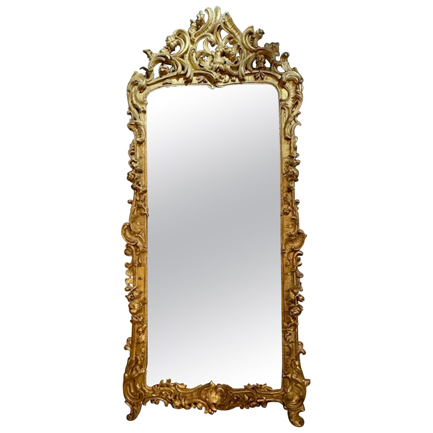 Specchio italiano in legno dorato intagliato