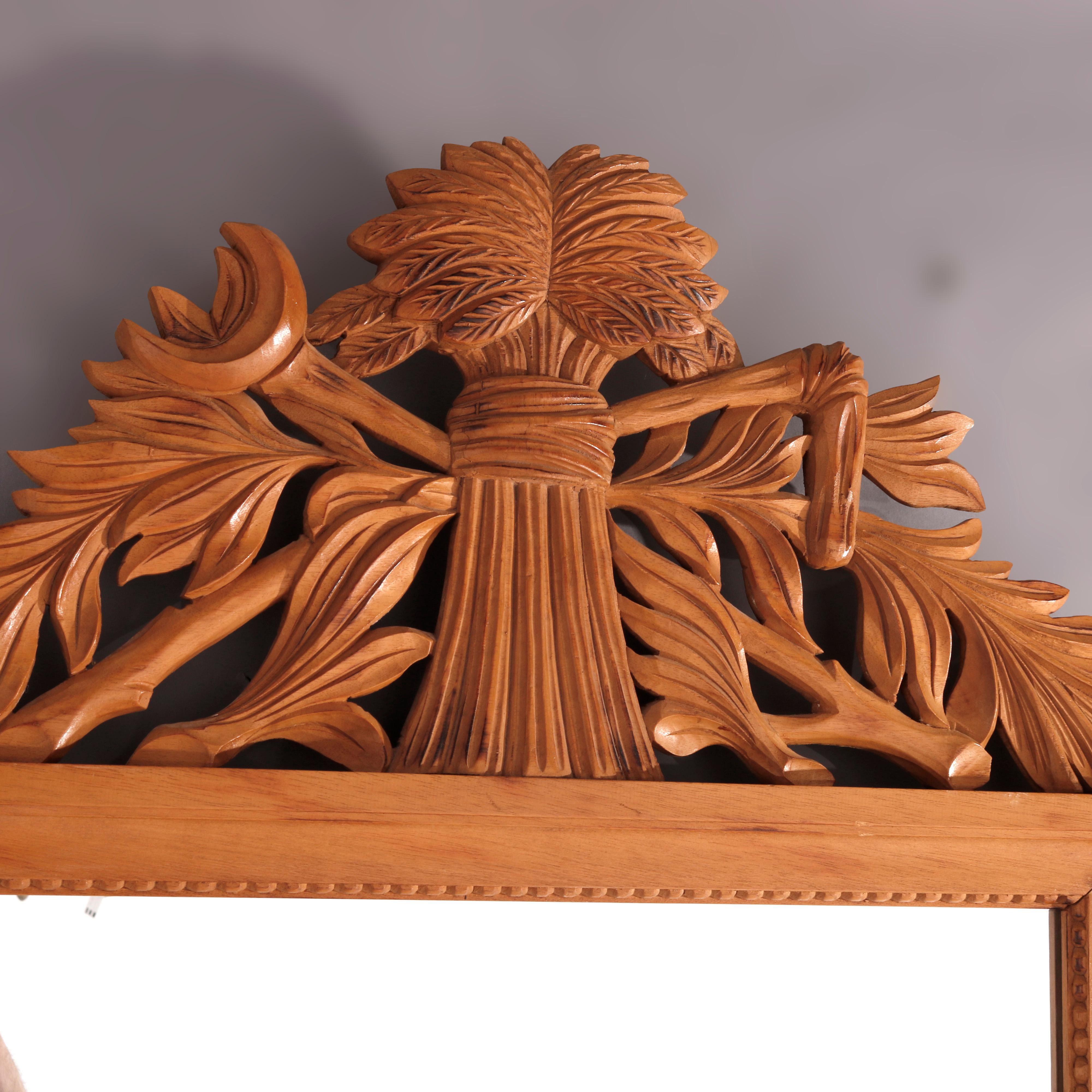 An Italian wall mirror offers carved hardwood frame with harvest wheat form pediment, 20th century

Measures - 52.5