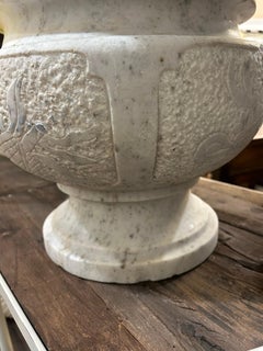 Italian Carved marble neoclassical urn with crisp carved coat of arms