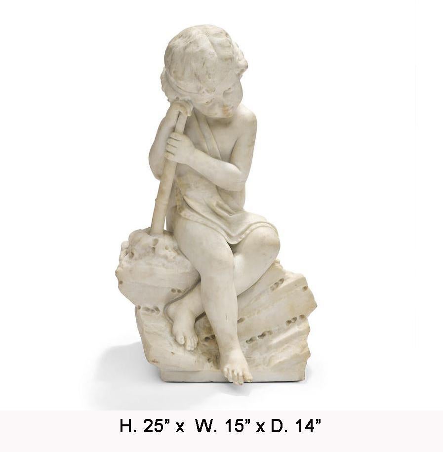 Exquisite Italian marble hand carved sculpture of a child dressed in Classical robes leaned on a staff, seated on a rock-form naturalistic rock.
Meticulous attention was given to the details of this sculpture. The details and proportion of the face