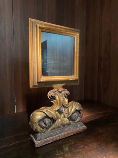 Antique Italian Mirror in Painted Golden Wood with baroque base, 1790s.