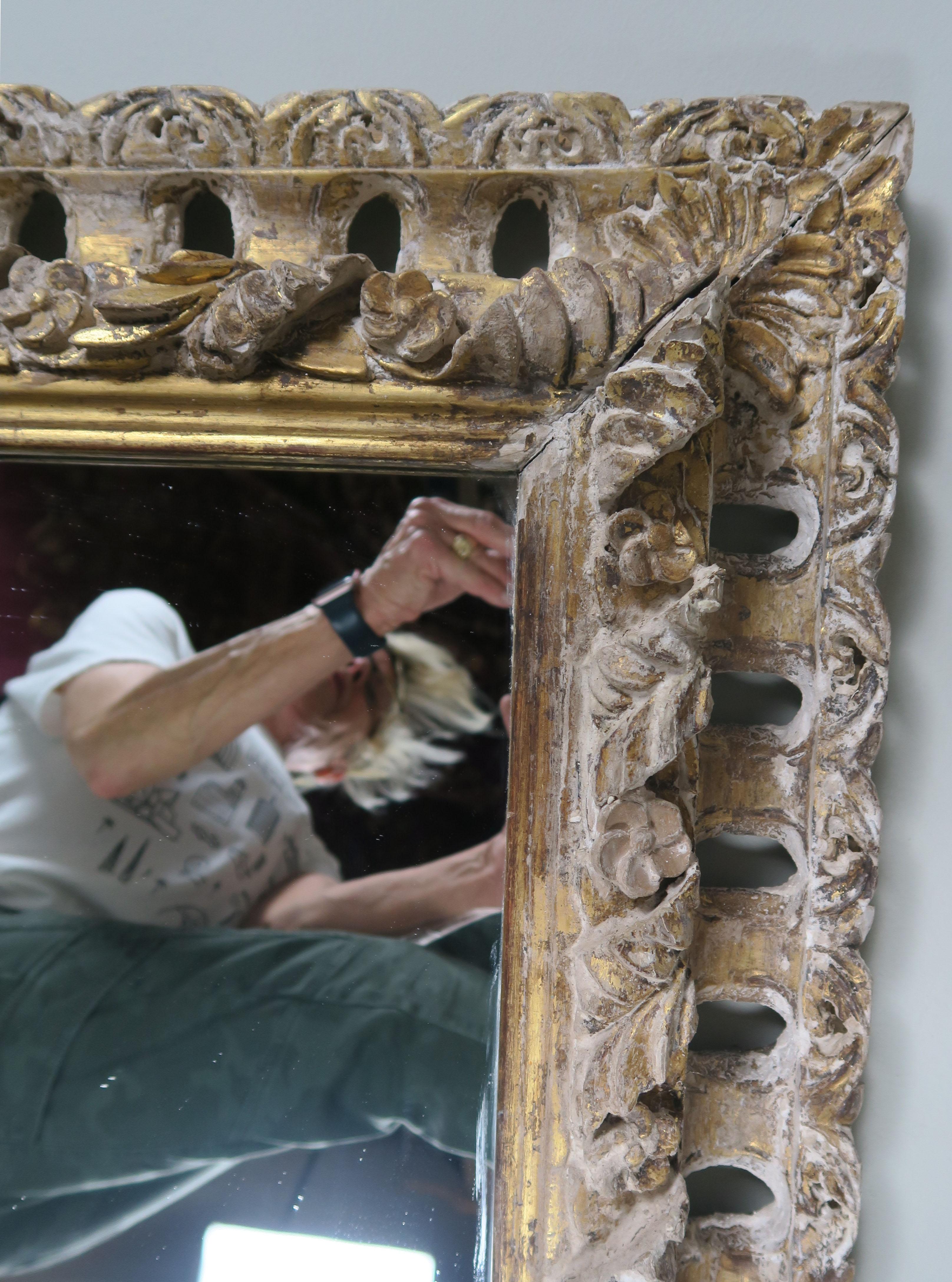 Mid-20th Century Italian Carved Painted Mirror with Gold Leaf Accents