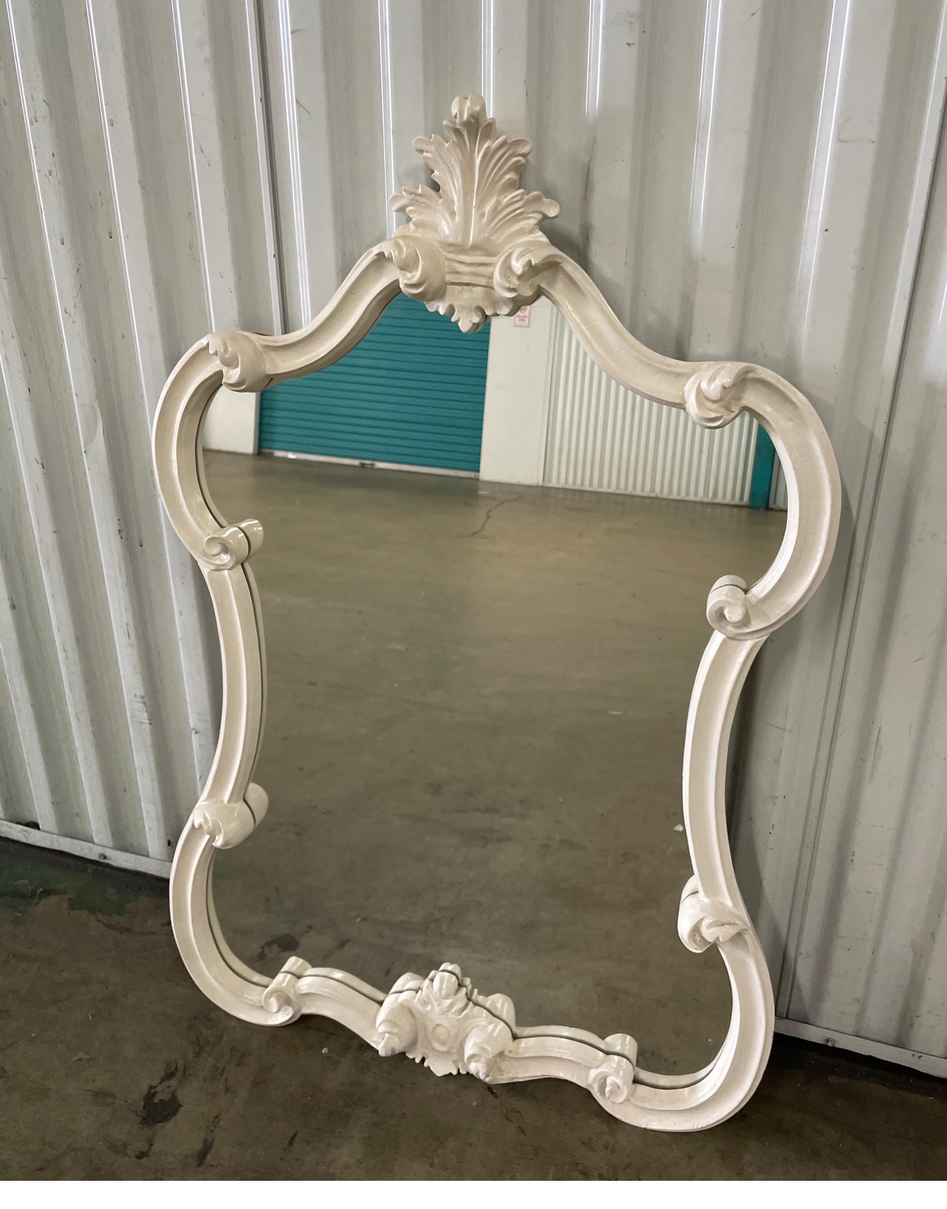 Lovely vintage carved and painted Italian wall mirror. Would be a great powder room or small entry mirror. Simple and elegant.