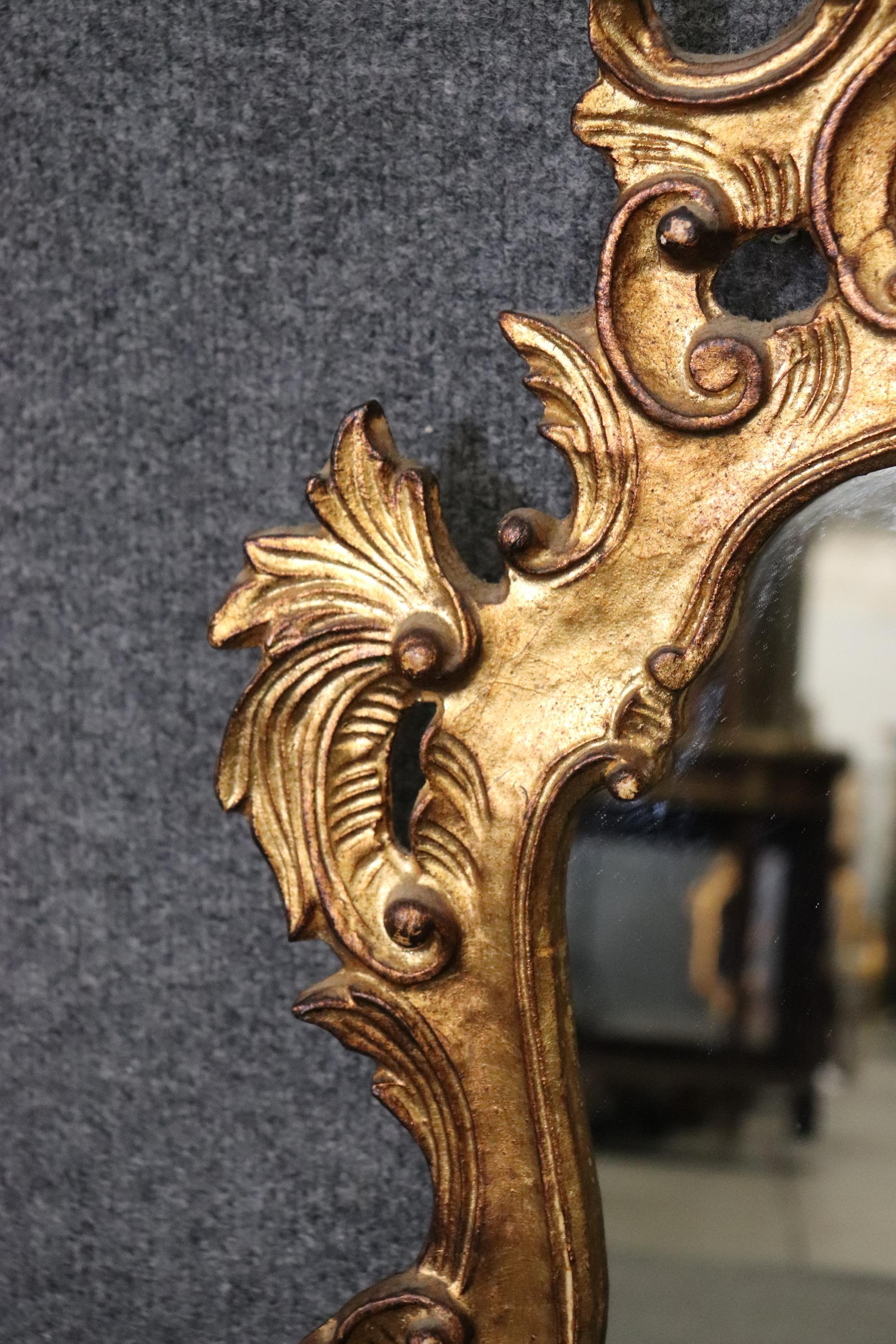 Italian Carved Rococo Gold Gilt Wall Hanging Mirror For Sale at 1stDibs
