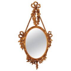 Italian Midcentury Carved Wall Mirror with Gilt Wooden Frame, 1950s