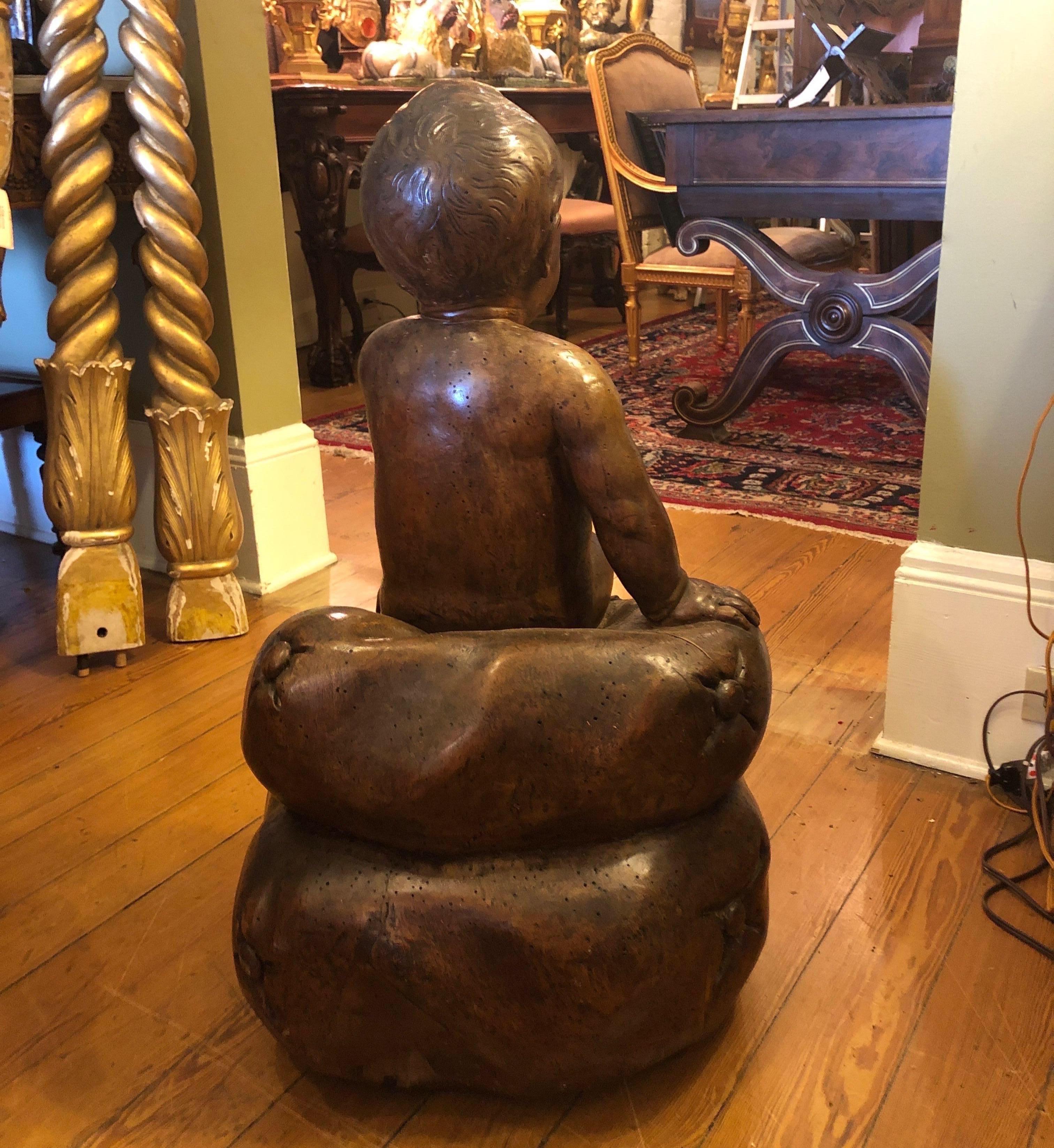 Italian Carved Walnut Baby on Cushion In Good Condition For Sale In Natchez, MS