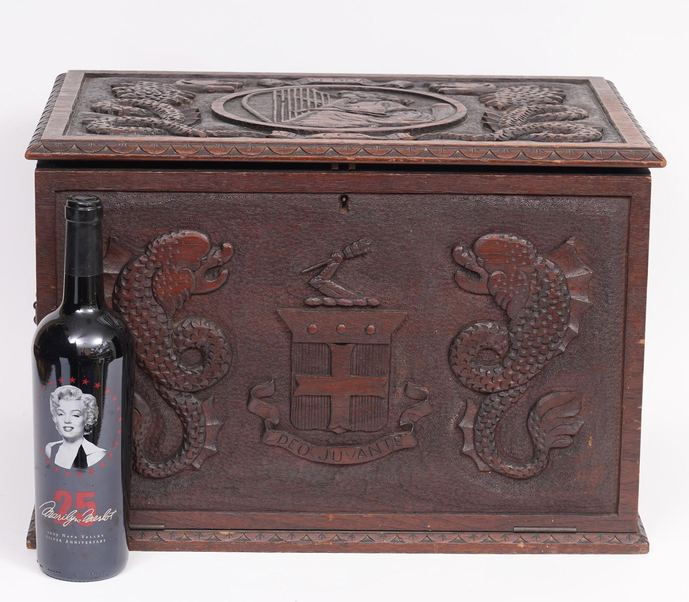 Italian Carved Walnut Captain's Box with Sea Monsters, Coat of Arms and Dolphins 7