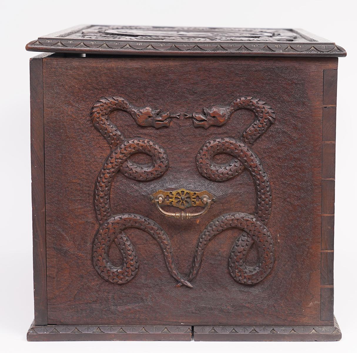 Italian Carved Walnut Captain's Box with Sea Monsters, Coat of Arms and Dolphins 2