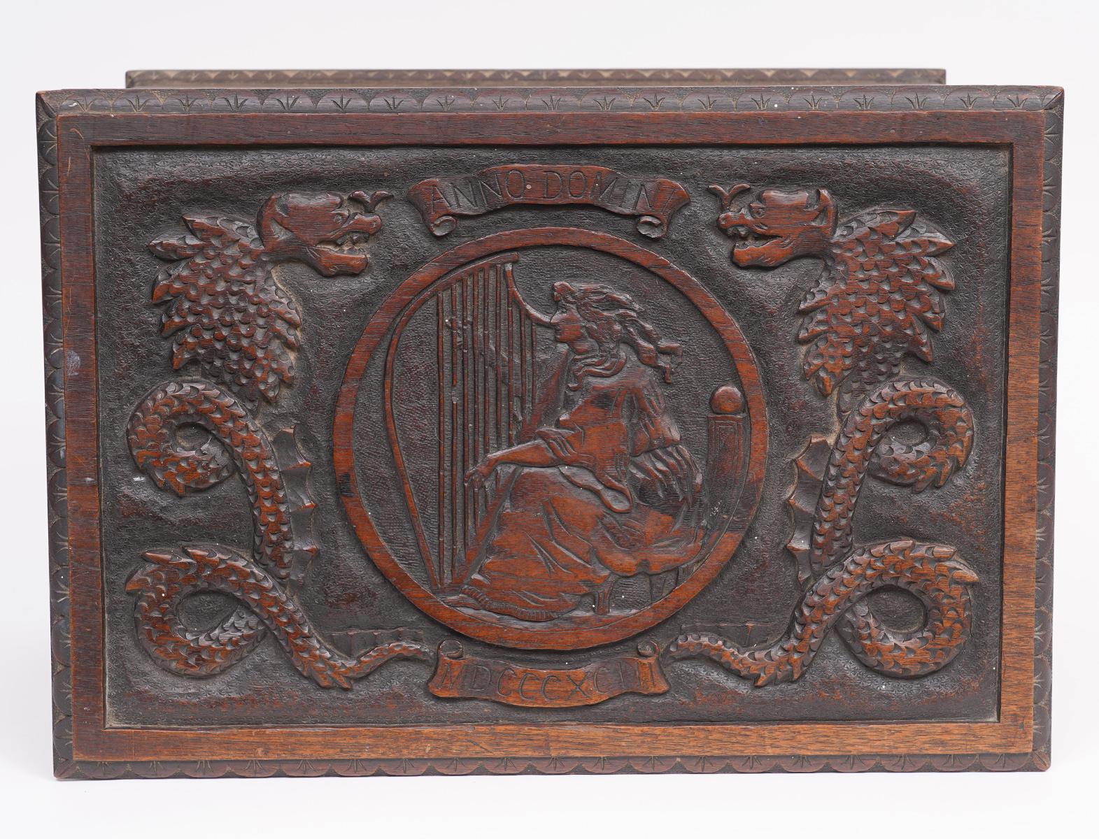 Italian Carved Walnut Captain's Box with Sea Monsters, Coat of Arms and Dolphins 3