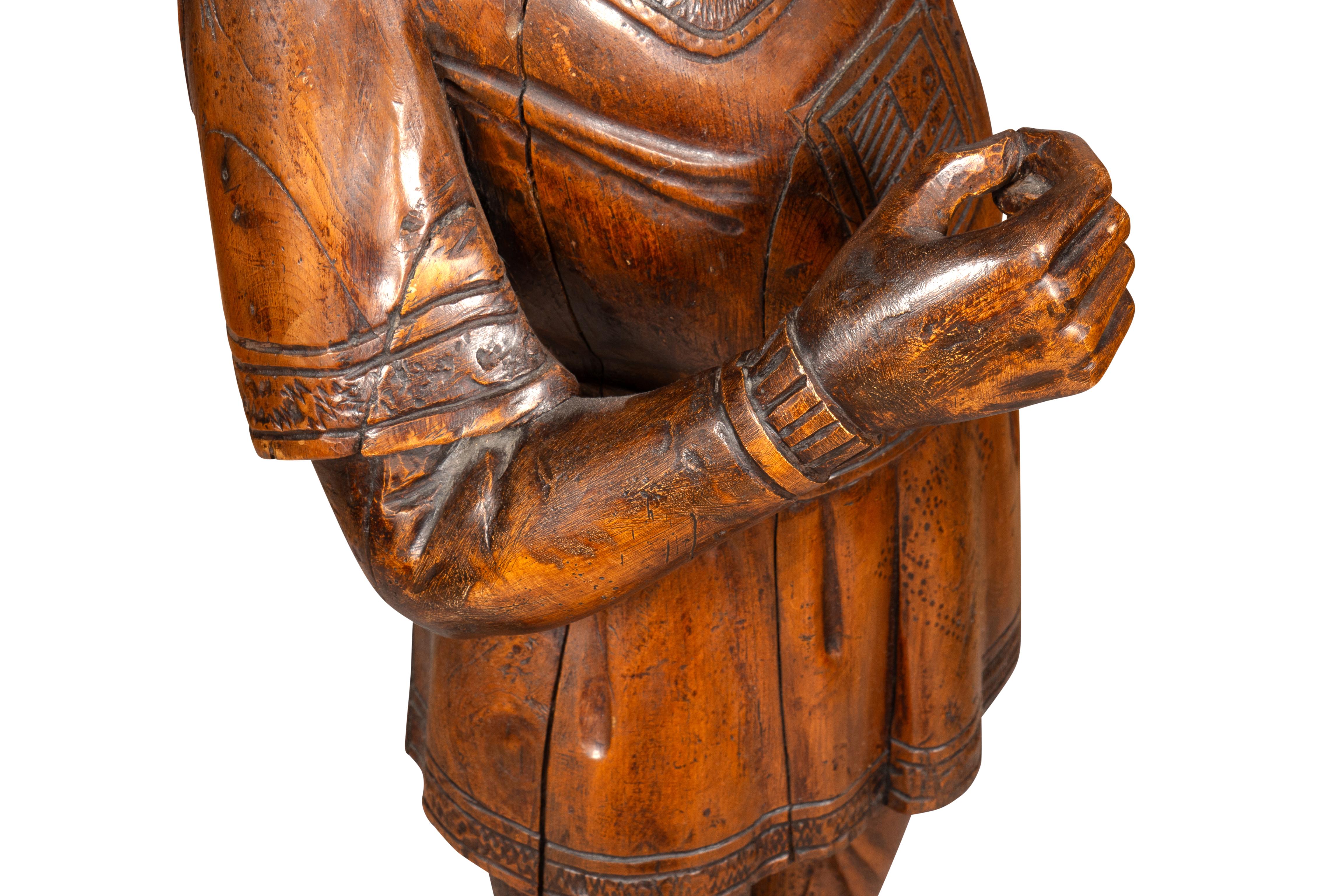 Italian Carved Walnut Torchere Of A Standing Boy Holding A Torch For Sale 6