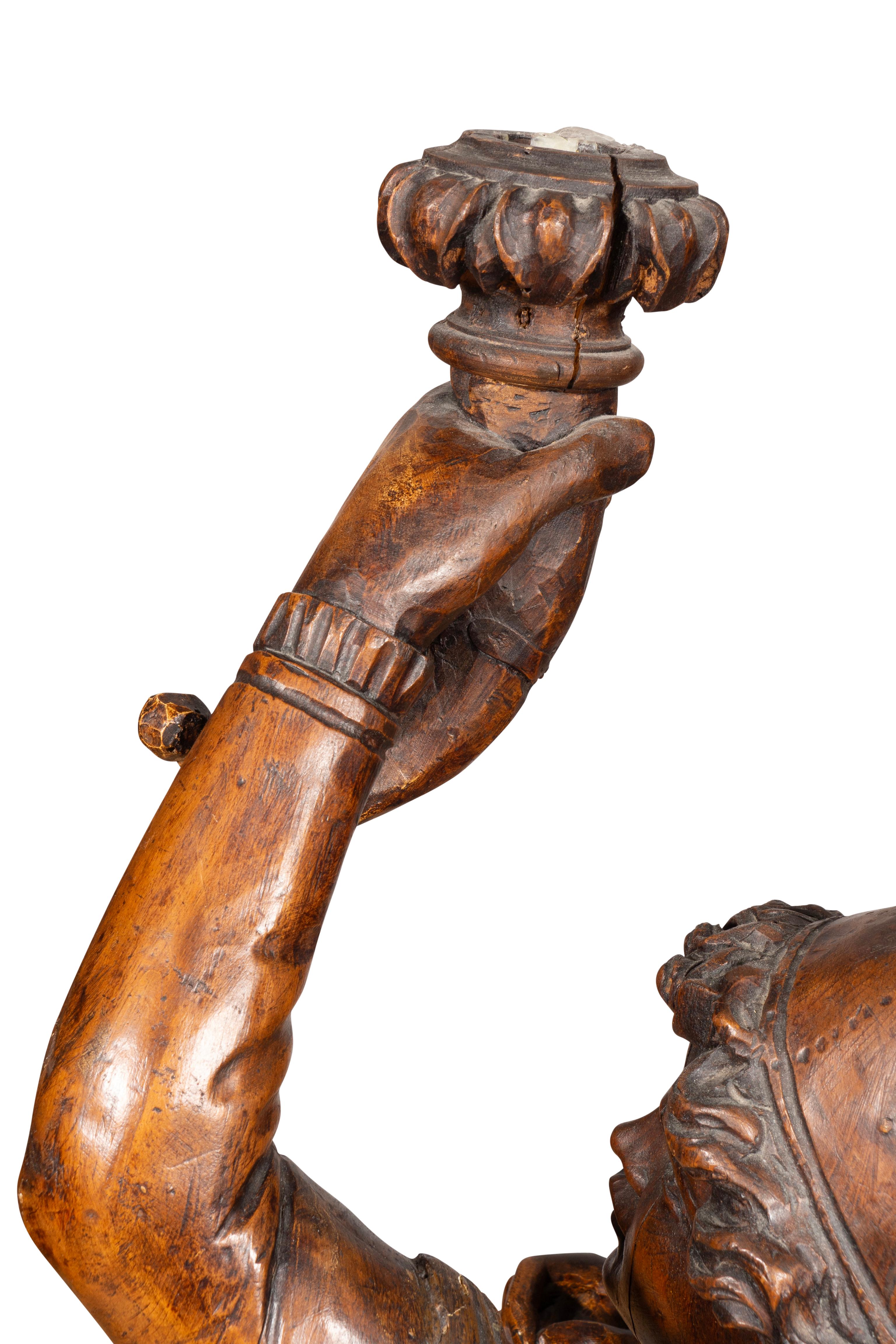 Italian Carved Walnut Torchere Of A Standing Boy Holding A Torch For Sale 10